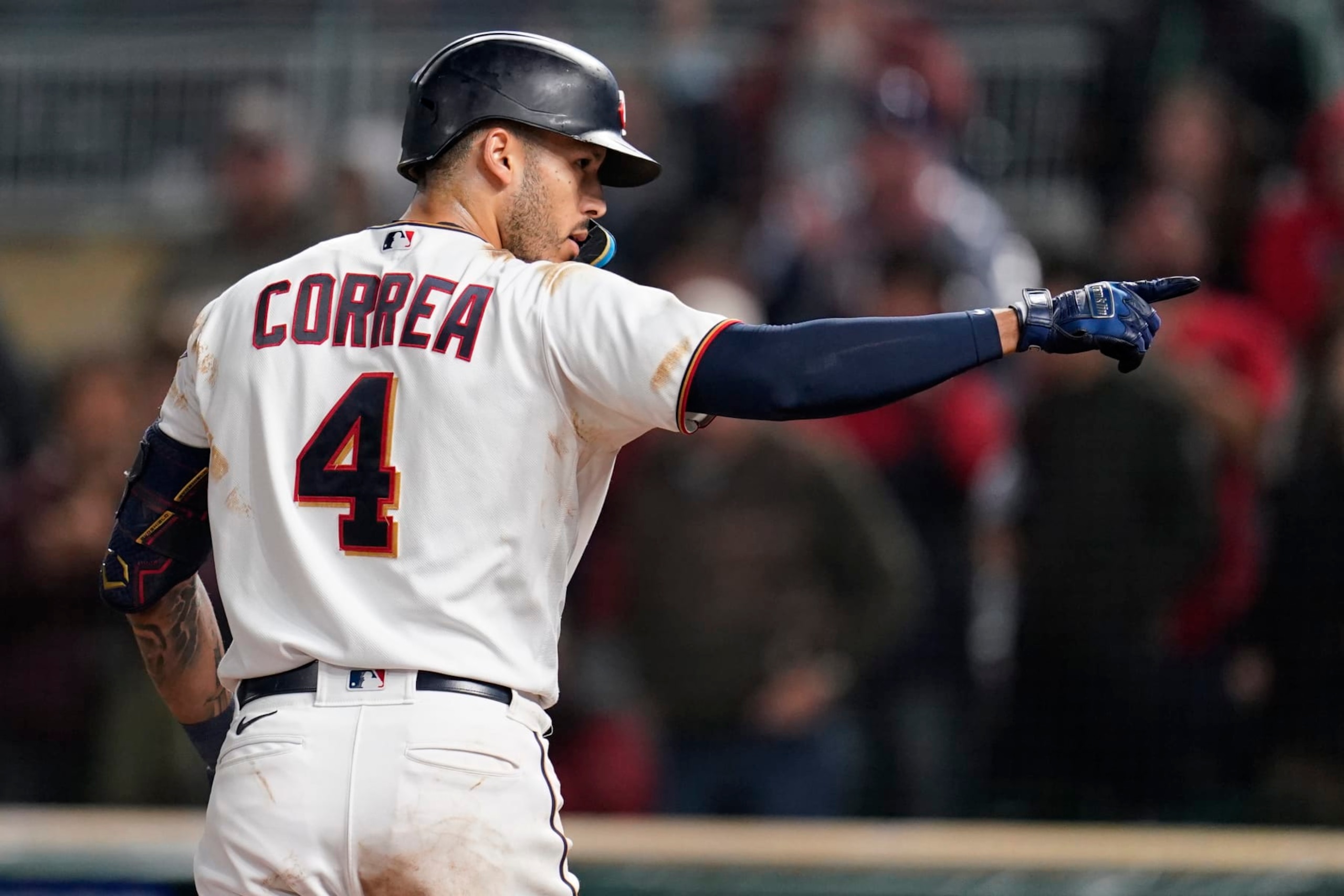 Minnesota Twins' Carlos Correa celebrates while crossing home plate after hitting a two-run home run during the eighth inning of the team's baseball game against the Cleveland Guardians, Friday, Sept. 9, 2022, in Minneapolis. (AP Photo/Abbie Parr) Minnesota Twins' Carlos Correa celebrates while crossing home plate after hitting a two-run home run during the eighth inning of the team's baseball game against the Cleveland Guardians, Friday, Sept. 9, 2022, in Minneapolis. (AP Photo/Abbie Parr)