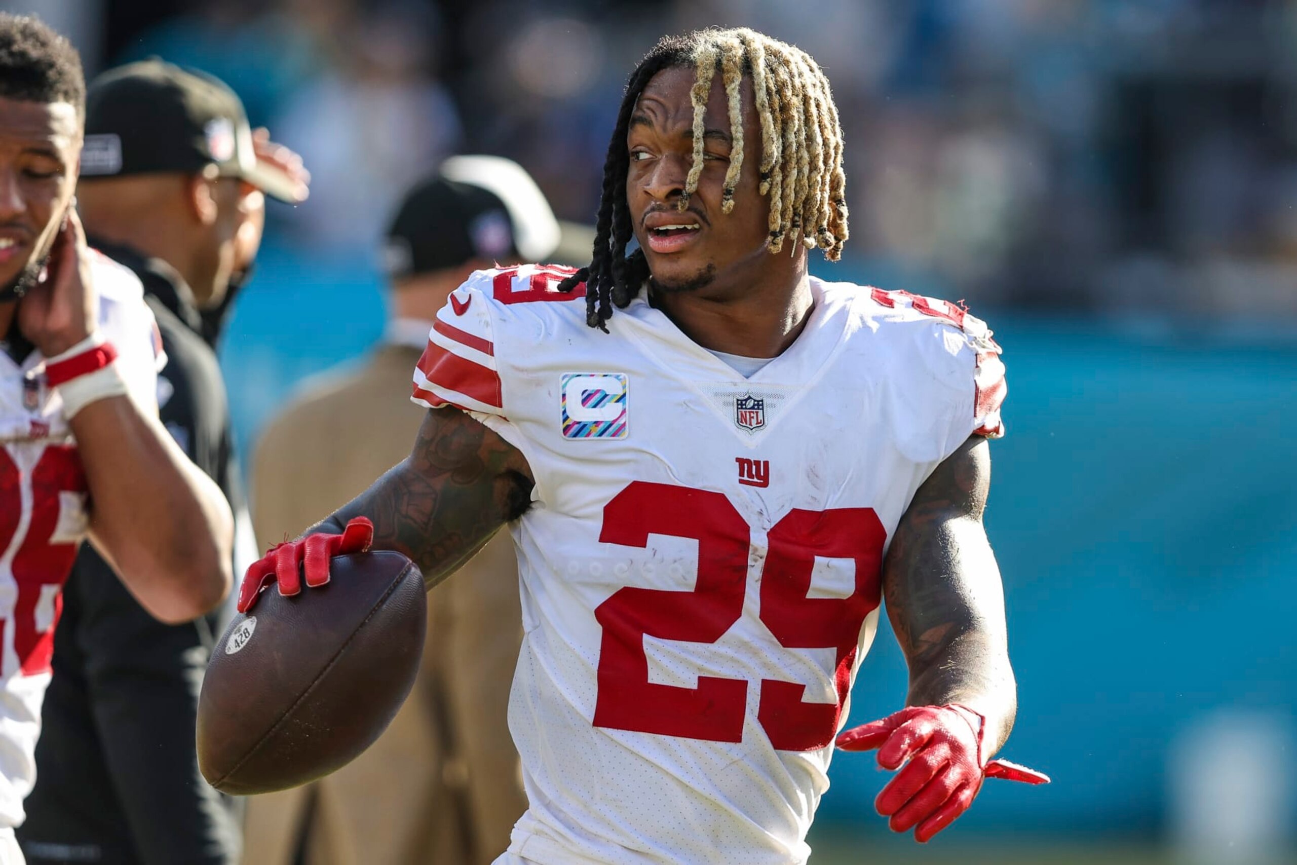 New York Giants safety Xavier McKinney (29) walks off the field after an NFL football game against the Jacksonville Jaguars on Sunday, Oct. 23, 2022, in Jacksonville, Fla. (AP Photo/Gary McCullough) New York Giants safety Xavier McKinney (29) walks off the field after an NFL football game against the Jacksonville Jaguars on Sunday, Oct. 23, 2022, in Jacksonville, Fla. (AP Photo/Gary McCullough)