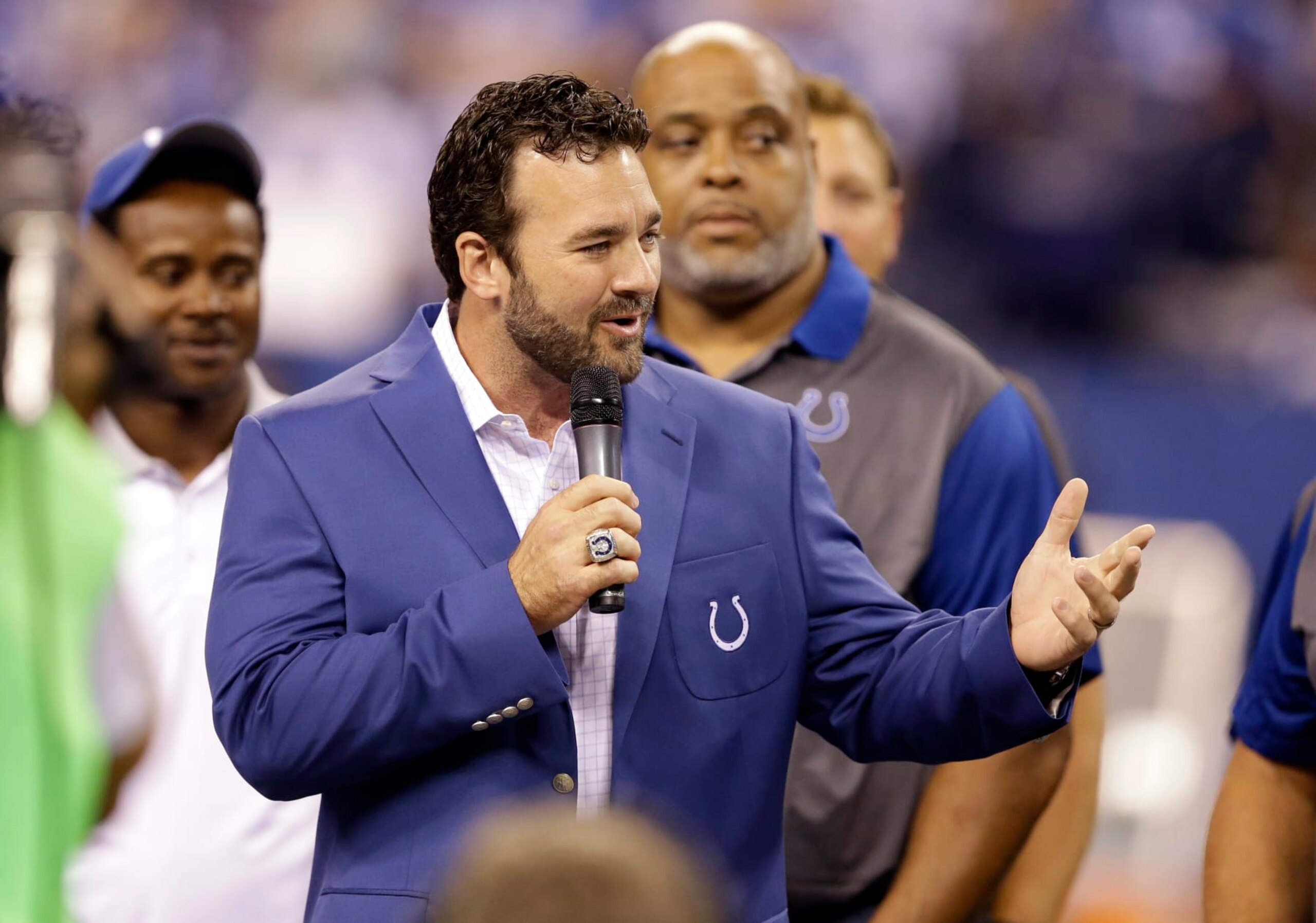 Former Indianapolis Colts center Jeff Saturday speaks to fans after he was inducted into the Colts Ring of Honor during halftime of an NFL football game between the Indianapolis Colts and the New York Jets in Indianapolis, Monday, Sept. 21, 2015. (AP Photo/Darron Cummings)