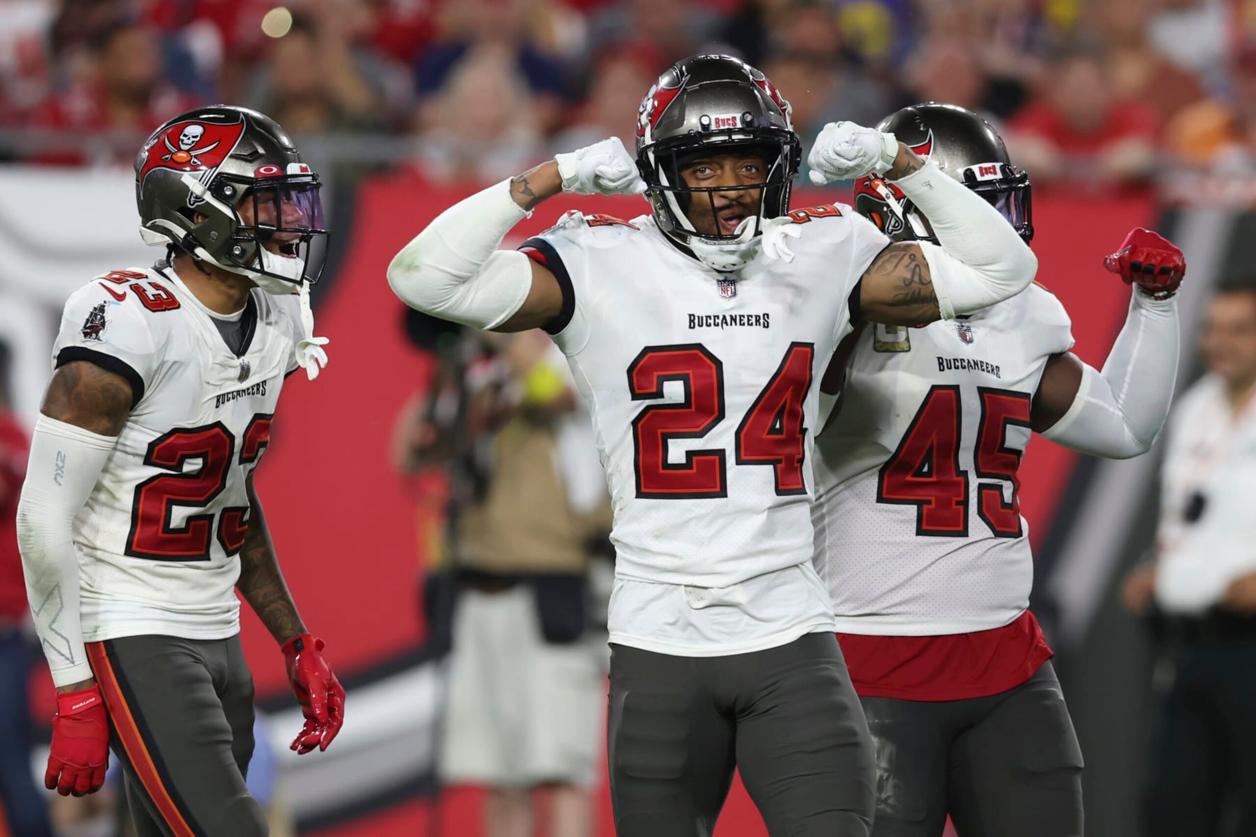 Tampa Bay Buccaneers cornerback Carlton Davis III (24) celebrates after tackling Los Angeles Rams wide receiver Cooper Kupp (10) during the second half of an NFL football game between the Los Angeles Rams and Tampa Bay Buccaneers, Sunday, Nov. 6, 2022, in Tampa, Fla. (AP Photo/Mark LoMoglio) Tampa Bay Buccaneers cornerback Carlton Davis III (24) celebrates after tackling Los Angeles Rams wide receiver Cooper Kupp (10) during the second half of an NFL football game between the Los Angeles Rams and Tampa Bay Buccaneers, Sunday, Nov. 6, 2022, in Tampa, Fla. (AP Photo/Mark LoMoglio)
