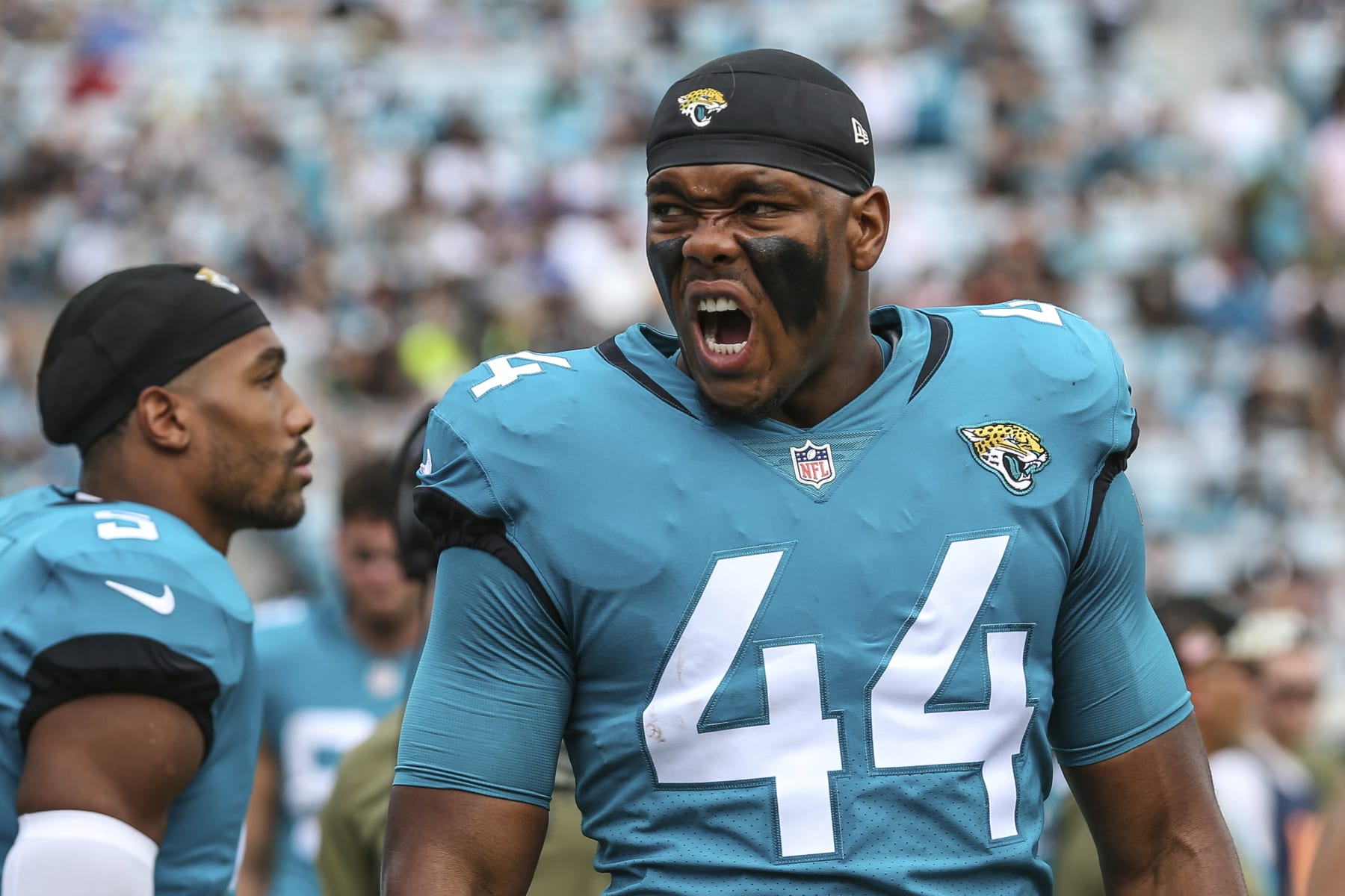 Jacksonville Jaguars linebacker Travon Walker (44) spurs on his teammates before an NFL football game against the Las Vegas Raiders on Sunday, Nov. 6, 2022, in Jacksonville, Fla. (AP Photo/Gary McCullough)