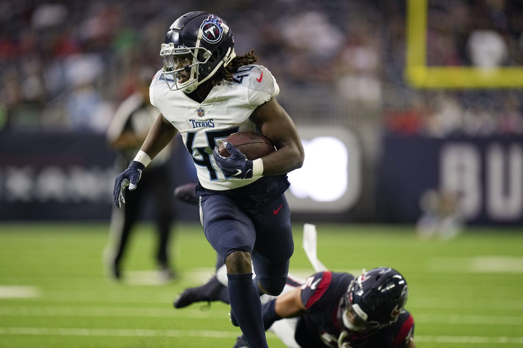 Tennessee Titans running back Dontrell Hilliard (40) carries the ball against the Houston Texans during the second half of an NFL football game Sunday, Oct. 30, 2022, in Houston. (AP Photo/Eric Gay)
