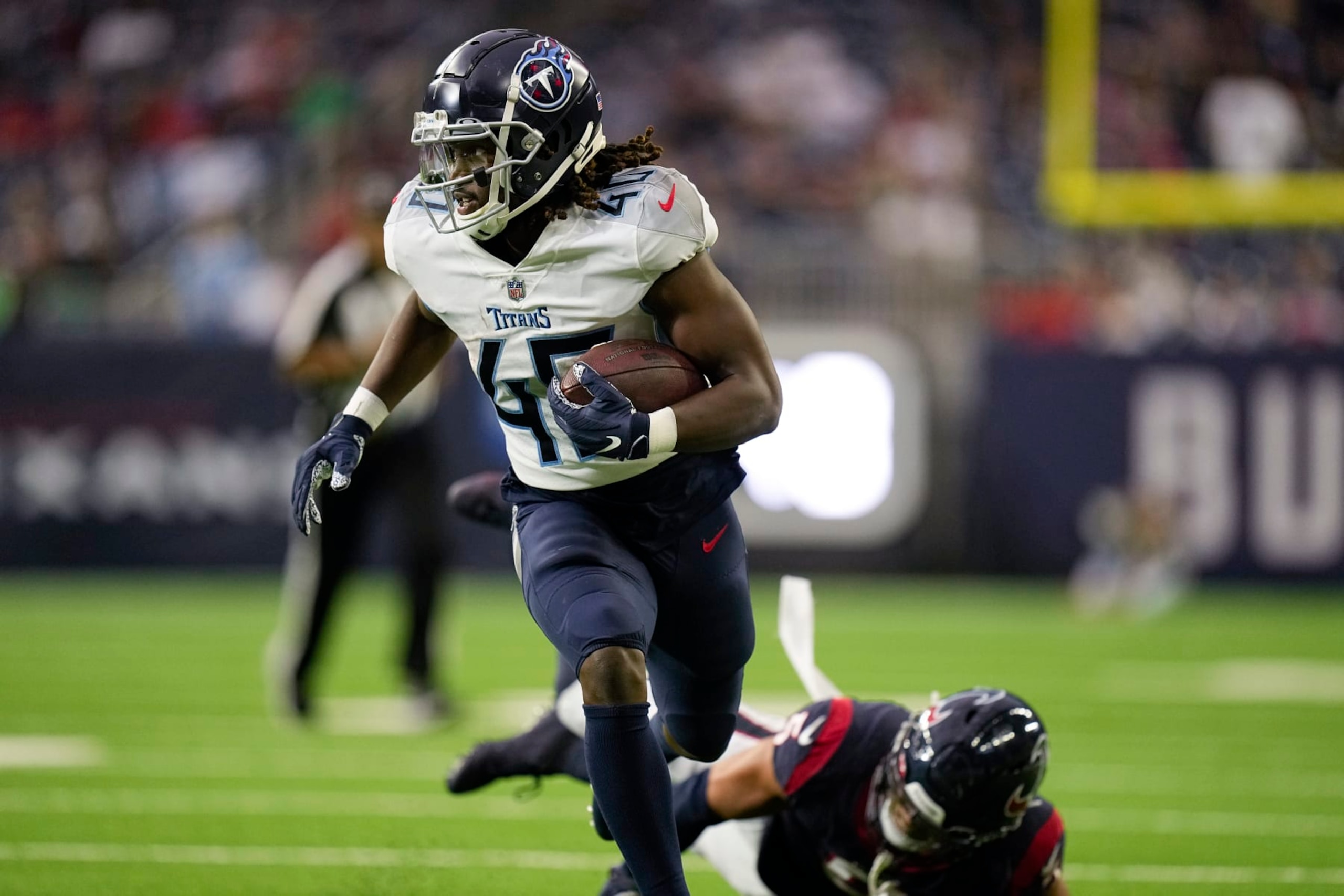 Tennessee Titans running back Dontrell Hilliard (40) carries the ball against the Houston Texans during the second half of an NFL football game Sunday, Oct. 30, 2022, in Houston. (AP Photo/Eric Gay)