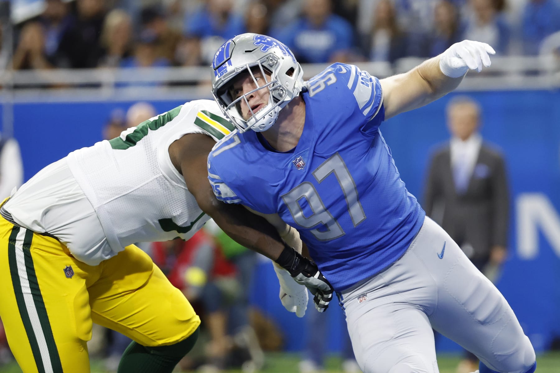 Detroit Lions defensive end Aidan Hutchinson (97) rushes on defense at Green Bay Packers offensive tackle Yosh Nijman (73) in the first half during an NFL football game, Sunday, Nov. 6, 2022, in Detroit. (AP Photo/Rick Osentoski)