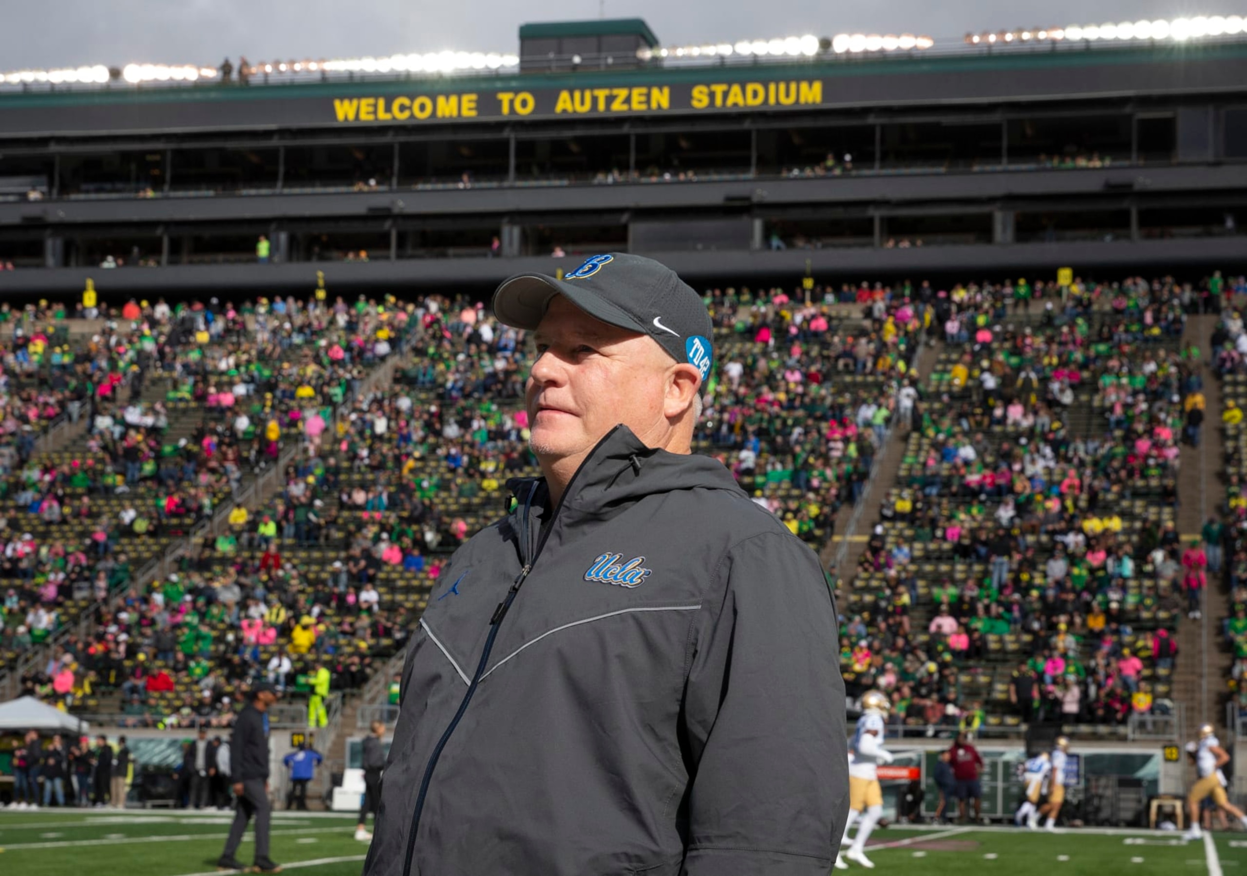 UCLA head coach Chip Kelly walks the sidelines at Autzen Stadium before an NCAA college football game against Oregon Saturday, Oct. 22, 2022, in Eugene, Ore. (AP Photo/Chris Pietsch)