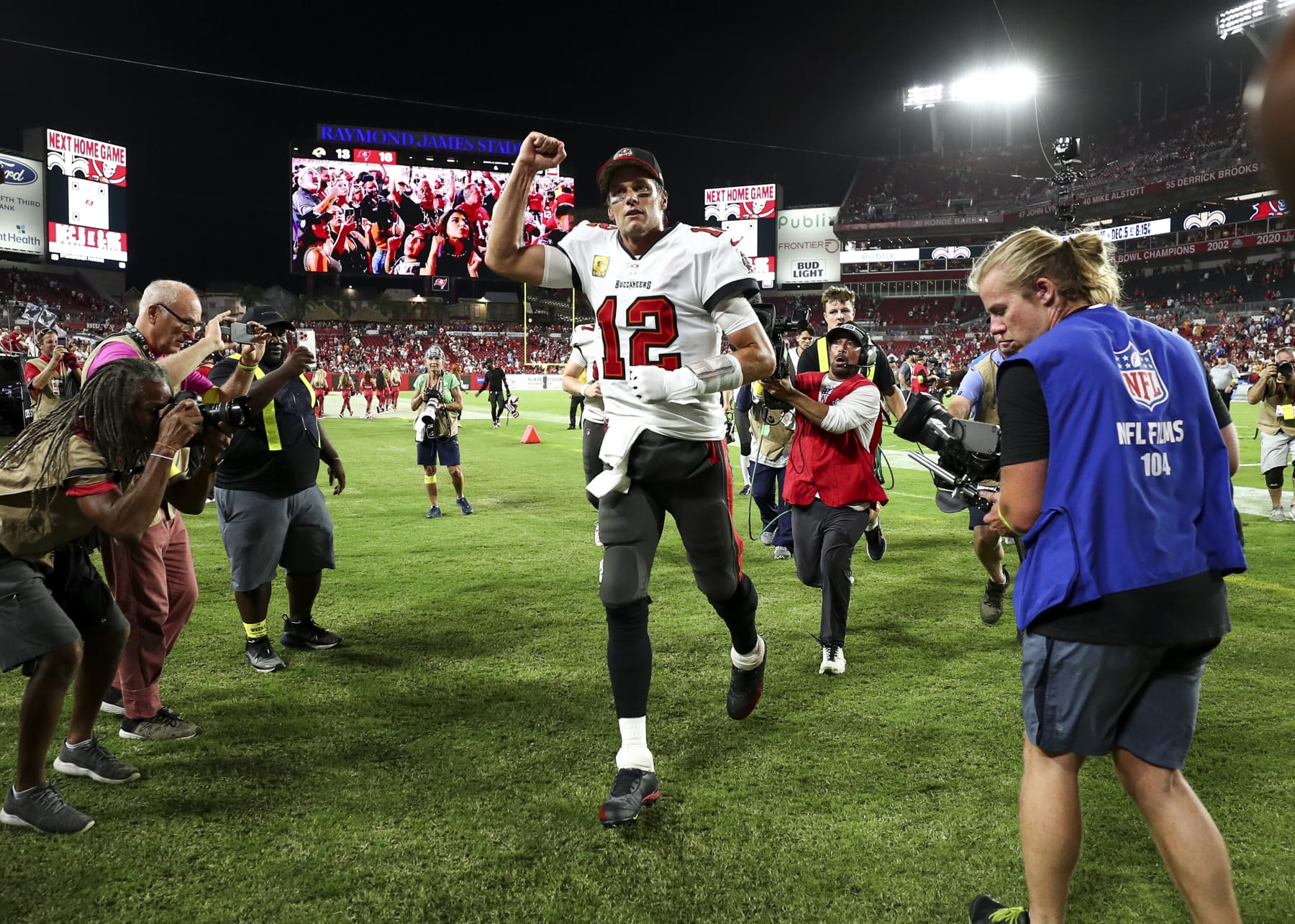 TAMPA, FL - NOVEMBER 6: Tom Brady #12 of the Tampa Bay Buccaneers celebrates with fans after an NFL football game against the Los Angeles Rams at Raymond James Stadium on November 6, 2022 in Tampa, Florida. (Photo by Kevin Sabitus/Getty Images)