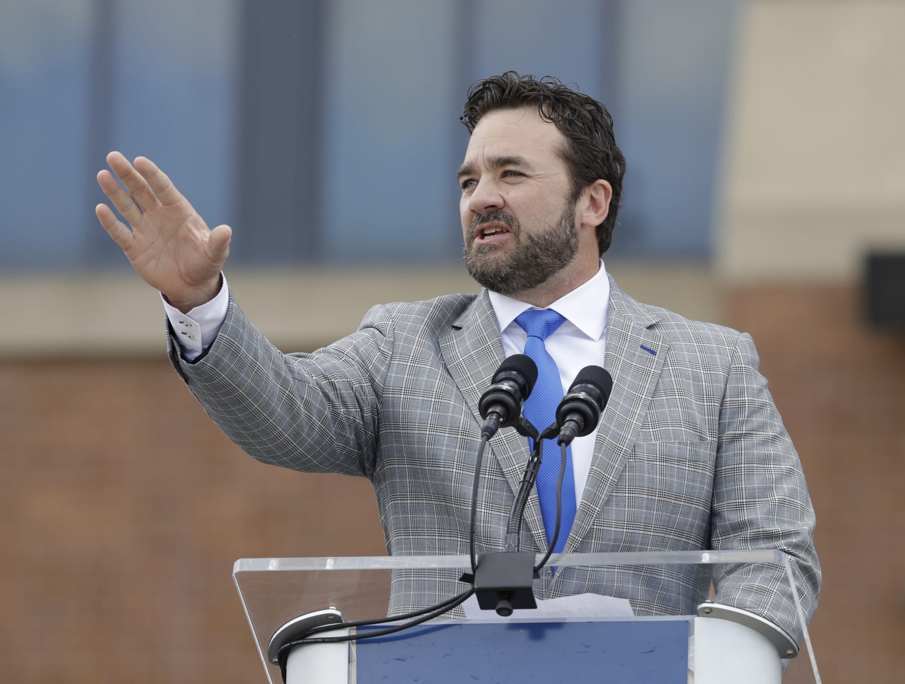 Former Indianapolis Colts center Jeff Saturday speaks during the unveiling of a Peyton Manning statue outside of Lucas Oil Stadium, Saturday, Oct. 7, 2017, in Indianapolis. (AP Photo/Darron Cummings)