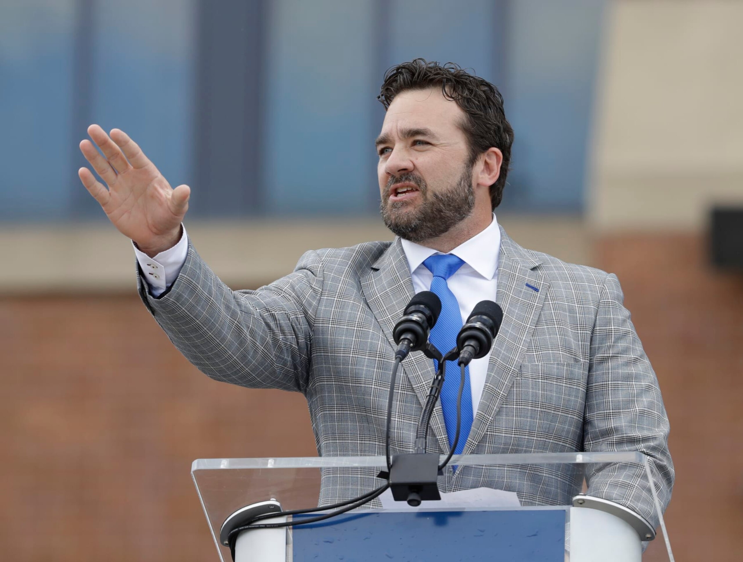 Former Indianapolis Colts center Jeff Saturday speaks during the unveiling of a Peyton Manning statue outside of Lucas Oil Stadium, Saturday, Oct. 7, 2017, in Indianapolis. (AP Photo/Darron Cummings)