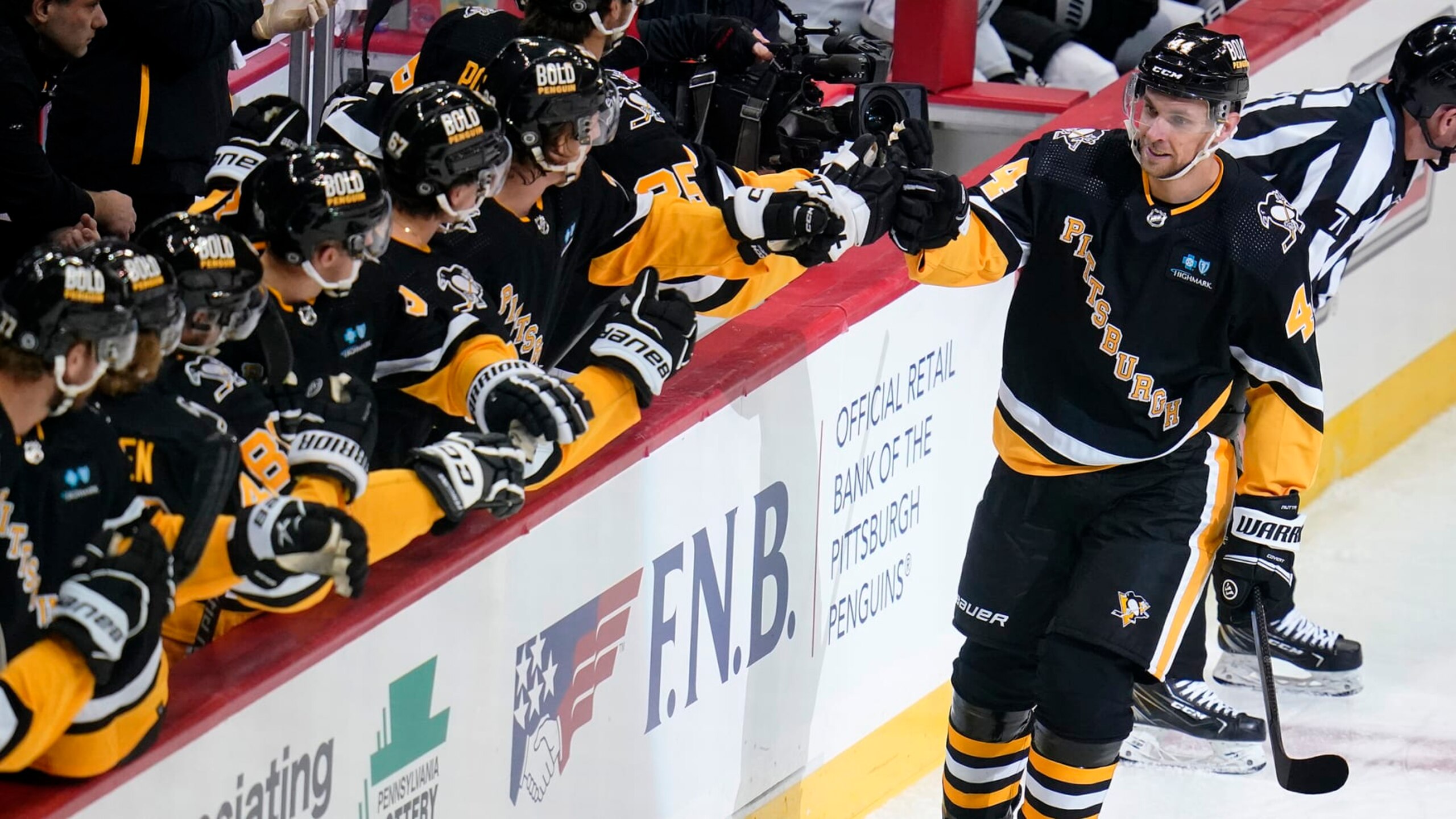 Pittsburgh Penguins' Jan Rutta (44) returns to the bench after scoring during the first period of an NHL hockey game against the Los Angeles Kings in Pittsburgh, Thursday, Oct. 20, 2022. (AP Photo/Gene J. Puskar) Pittsburgh Penguins' Jan Rutta (44) returns to the bench after scoring during the first period of an NHL hockey game against the Los Angeles Kings in Pittsburgh, Thursday, Oct. 20, 2022. (AP Photo/Gene J. Puskar)