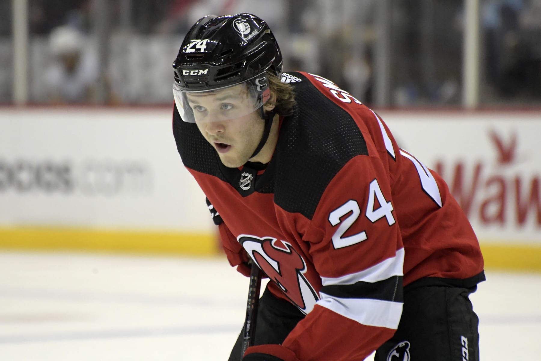 New Jersey Devils defenseman Ty Smith (24) during the second period of an NHL hockey game against the Pittsburgh Penguins Sunday, Dec. 19, 2021, in Newark, N.J. (AP Photo/Bill Kostroun)