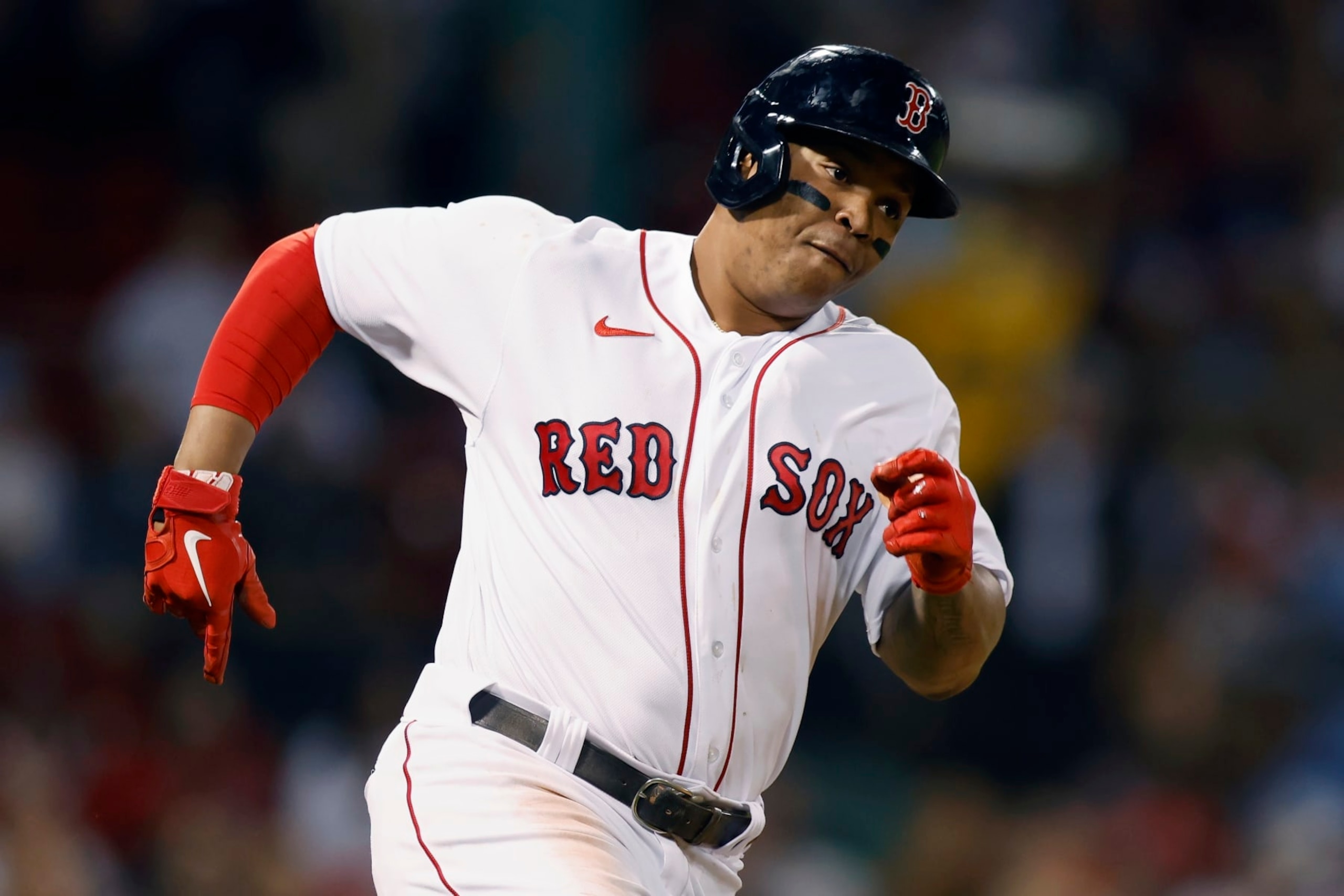 Boston Red Sox's Rafael Devers runs on his double during the first inning of a baseball game against the Baltimore Orioles, Monday, Sept. 26, 2022, in Boston. (AP Photo/Michael Dwyer)