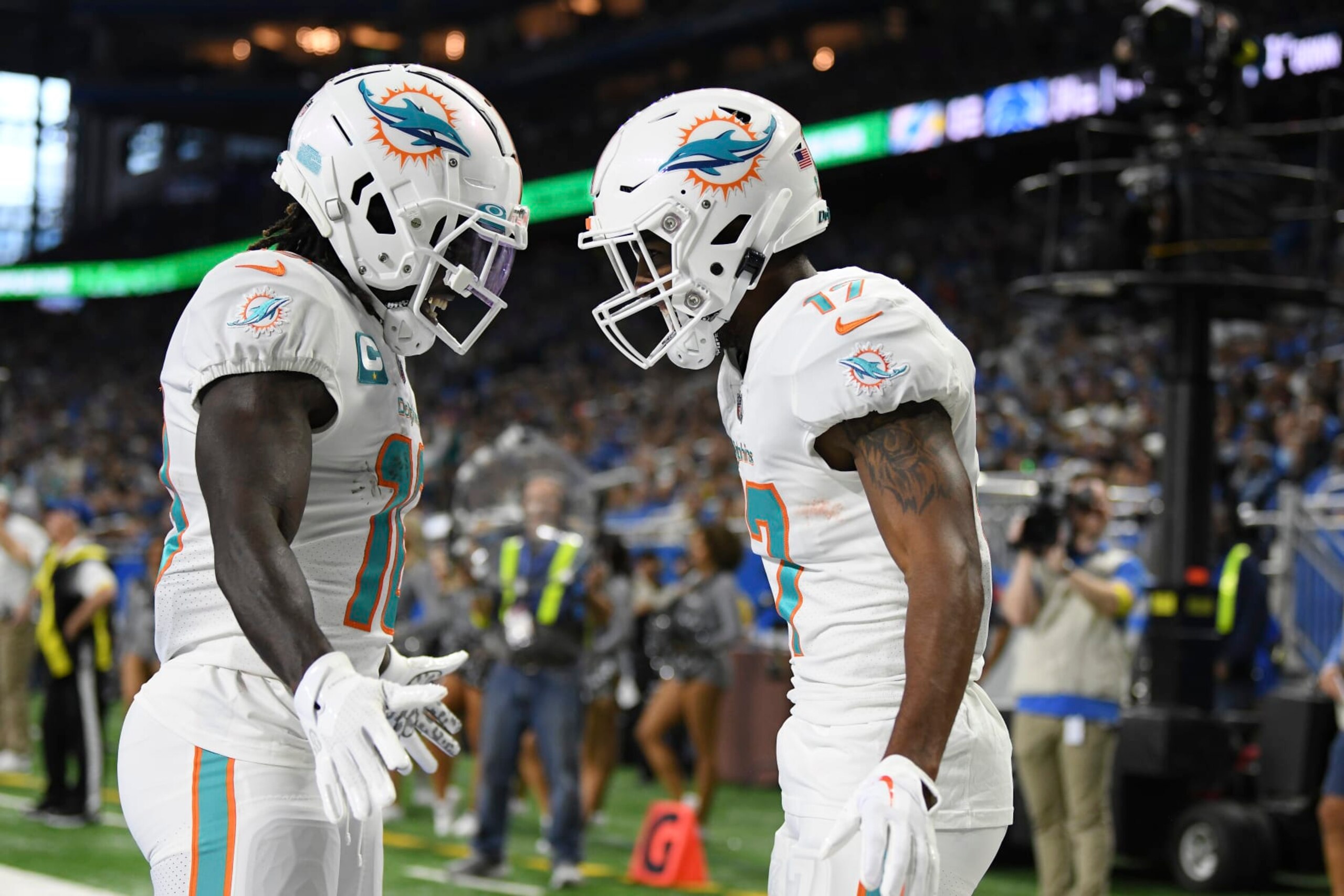 Miami Dolphins wide receiver Jaylen Waddle, right, greets wide receiver Tyreek Hill after catching a 5-yard pass for a touchdown during the first half of an NFL football game against the Detroit Lions, Sunday, Oct. 30, 2022, in Detroit. (AP Photo/Lon Horwedel) Miami Dolphins wide receiver Jaylen Waddle, right, greets wide receiver Tyreek Hill after catching a 5-yard pass for a touchdown during the first half of an NFL football game against the Detroit Lions, Sunday, Oct. 30, 2022, in Detroit. (AP Photo/Lon Horwedel)
