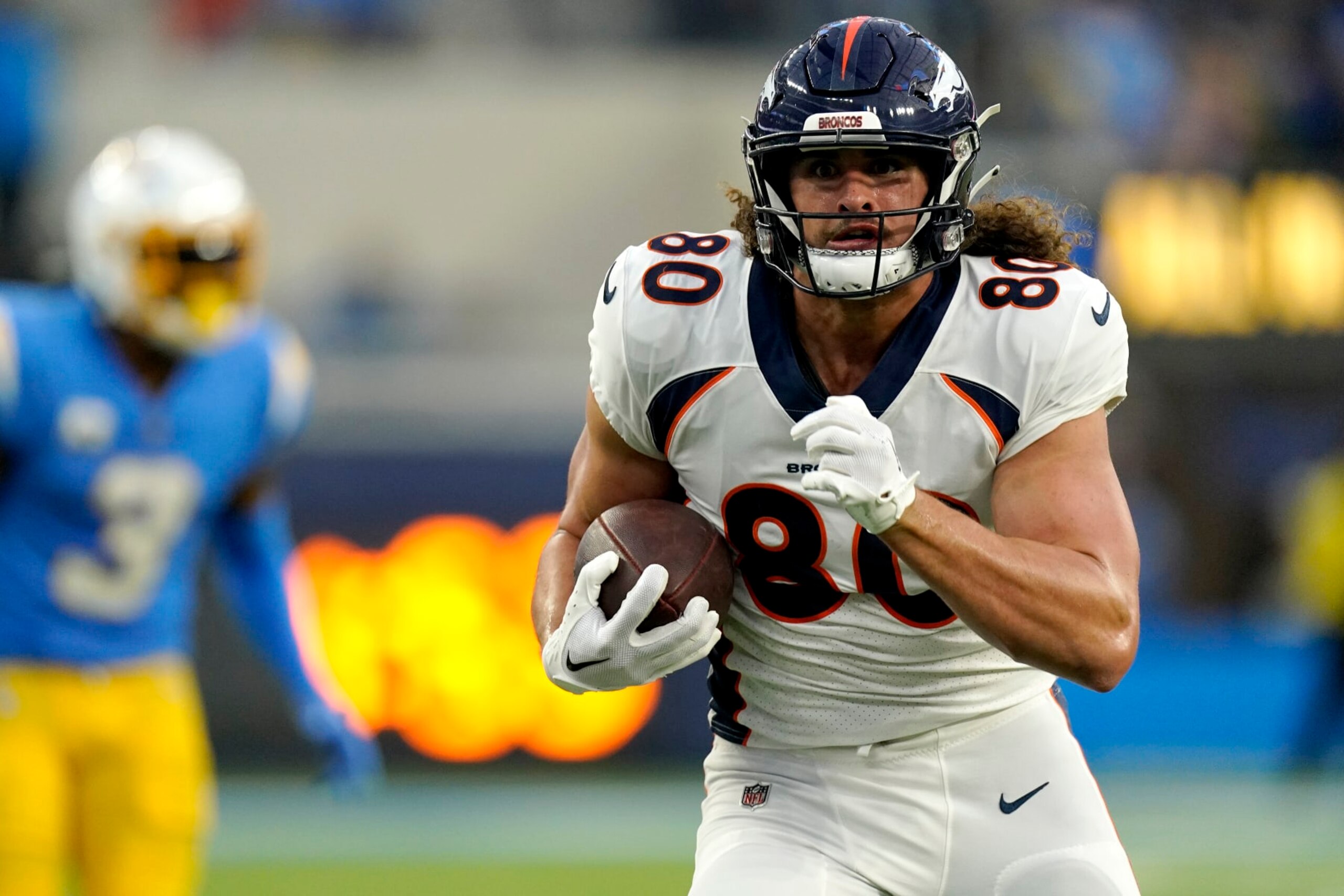 Denver Broncos tight end Greg Dulcich (80) pulls in a touchdown catch against the Los Angeles Chargers during the first half of an NFL football game, Monday, Oct. 17, 2022, in Inglewood, Calif. (AP Photo/Mark J. Terrill) Denver Broncos tight end Greg Dulcich (80) pulls in a touchdown catch against the Los Angeles Chargers during the first half of an NFL football game, Monday, Oct. 17, 2022, in Inglewood, Calif. (AP Photo/Mark J. Terrill)