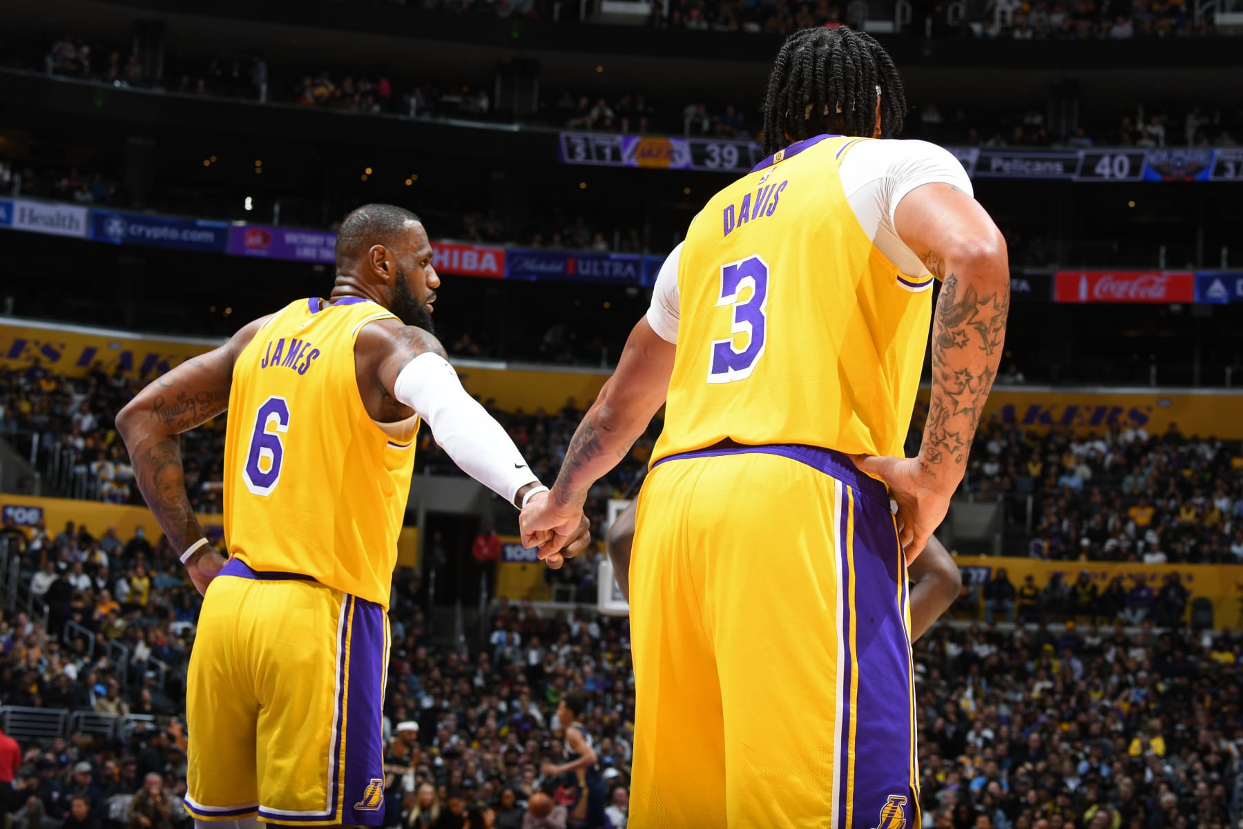 LOS ANGELES, CA - NOVEMBER 2: LeBron James #6 of the Los Angeles Lakers and Anthony Davis #3 of the Los Angeles Lakers shake hands against the New Orleans Pelicans on November 2, 2022 at Crypto.Com Arena in Los Angeles, California. NOTE TO USER: User expressly acknowledges and agrees that, by downloading and/or using this Photograph, user is consenting to the terms and conditions of the Getty Images License Agreement. Mandatory Copyright Notice: Copyright 2022 NBAE (Photo by Andrew D. Bernstein/NBAE via Getty Images)