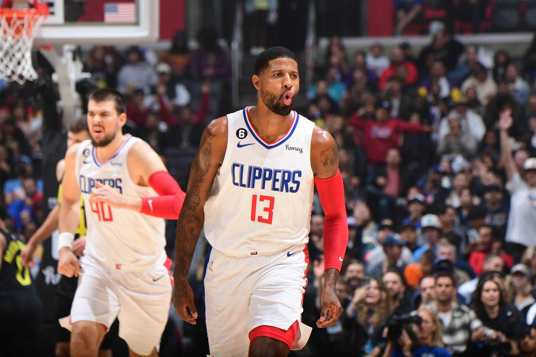 LOS ANGELES, CA - NOVEMBER 6: Paul George #13 of the LA Clippers reacts to a play during the game against the Utah Jazz on November 6, 2022 at Crypto.com Arena in Los Angeles, California. NOTE TO USER: User expressly acknowledges and agrees that, by downloading and/or using this Photograph, user is consenting to the terms and conditions of the Getty Images License Agreement. Mandatory Copyright Notice: Copyright 2022 NBAE (Photo by Adam Pantozzi/NBAE via Getty Images)
