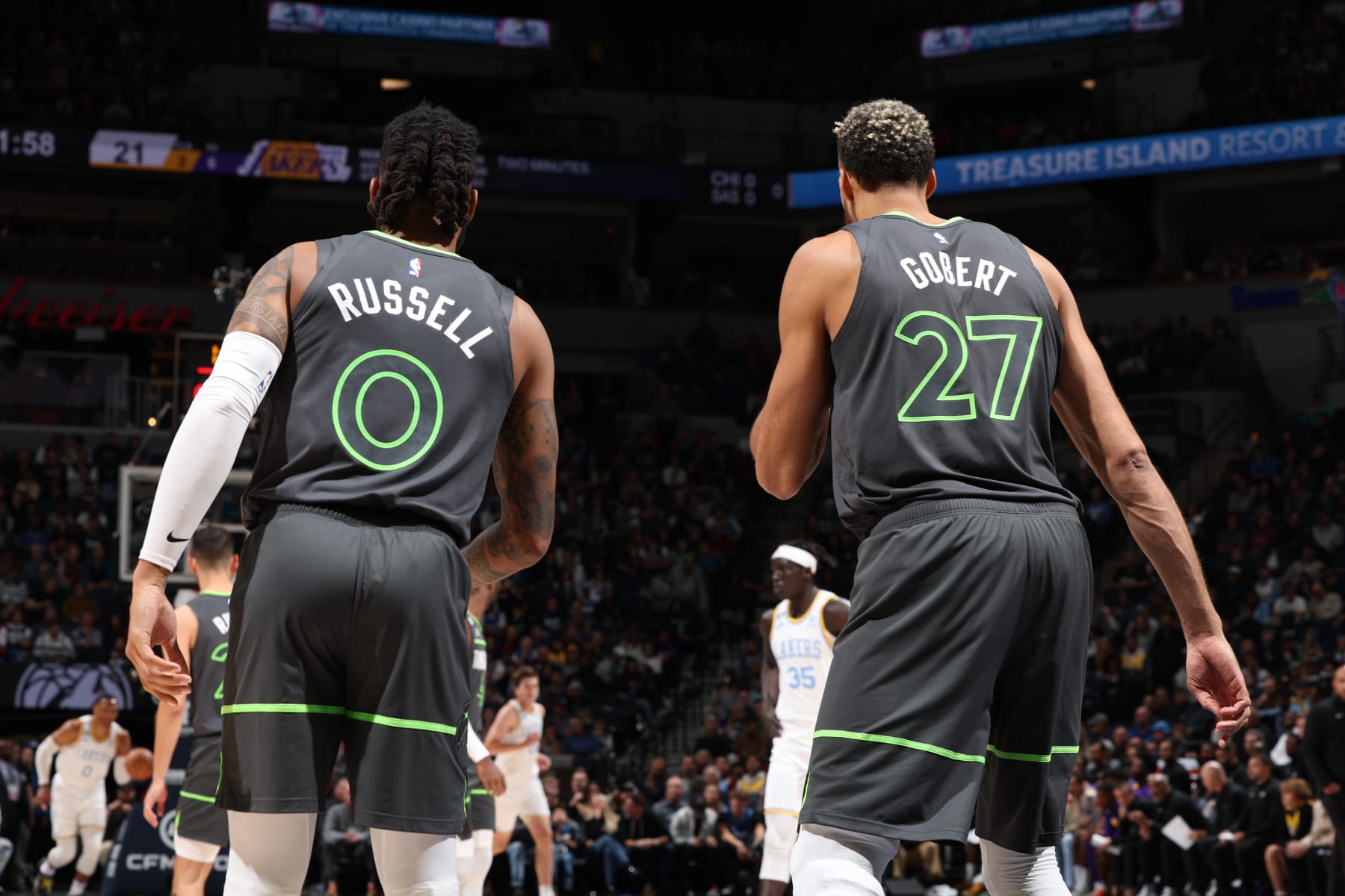 MINNEAPOLIS, MN -  OCTOBER 28: D'Angelo Russell #0 and Rudy Gobert #27 of the Minnesota Timberwolve looks on during the game against the Los Angeles Lakers on October 28, 2022 at Target Center in Minneapolis, Minnesota. NOTE TO USER: User expressly acknowledges and agrees that, by downloading and or using this Photograph, user is consenting to the terms and conditions of the Getty Images License Agreement. Mandatory Copyright Notice: Copyright 2022 NBAE (Photo by David Sherman/NBAE via Getty Images)