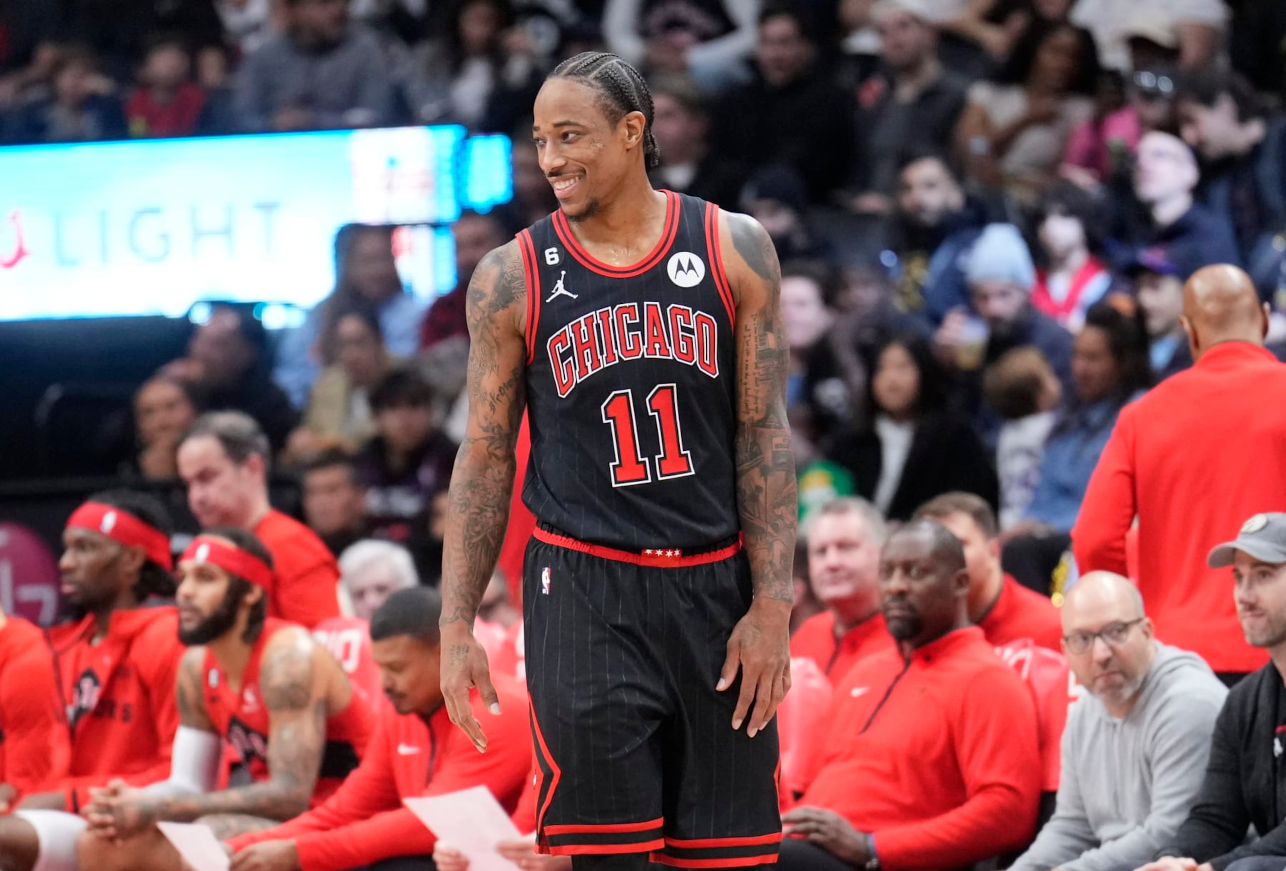 TORONTO, ON - NOVEMBER 6: DeMar DeRozan #11 of the Chicago Bulls smiles against the Toronto Raptors during the first half of their basketball game at the Scotiabank Arena on November 6, 2022 in Toronto, Ontario, Canada. NOTE TO USER: User expressly acknowledges and agrees that, by downloading and/or using this Photograph, user is consenting to the terms and conditions of the Getty Images License Agreement. (Photo by Mark Blinch/Getty Images)