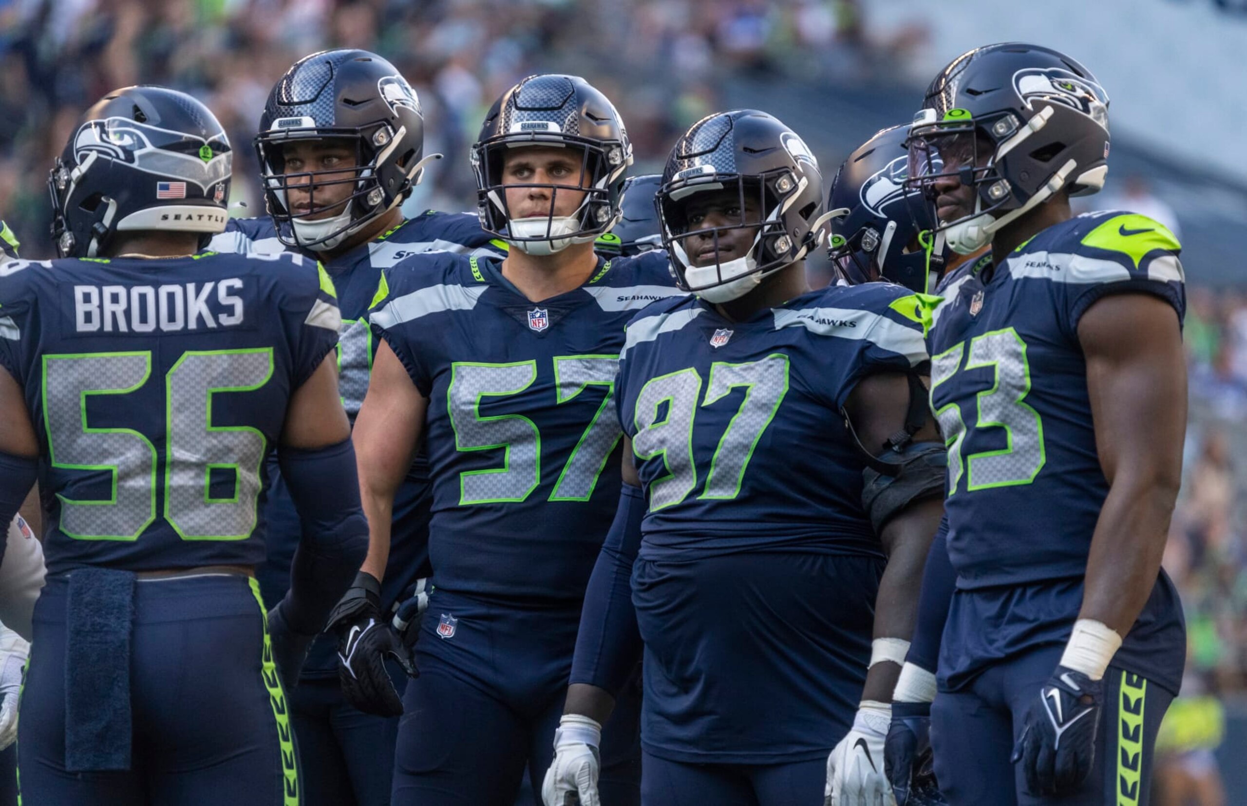 Member of the Seattle Seahawks defense from left, linebacker Jordyn Brooks, defensive lineman Al Woods, linebacker Cody Barton, defensive lineman Poona Ford and linebacker Boye Mafean are pictured during an NFL football game, Sunday, Sept. 25, 2022, in Seattle. The Falcons won 27-23. (AP Photo/Stephen Brashear) Member of the Seattle Seahawks defense from left, linebacker Jordyn Brooks, defensive lineman Al Woods, linebacker Cody Barton, defensive lineman Poona Ford and linebacker Boye Mafean are pictured during an NFL football game, Sunday, Sept. 25, 2022, in Seattle. The Falcons won 27-23. (AP Photo/Stephen Brashear)