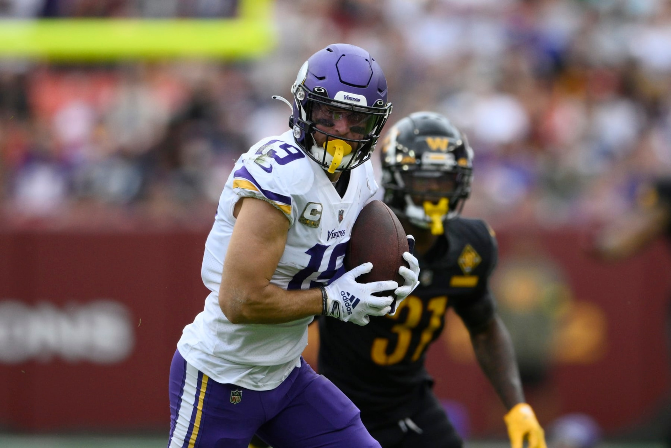 Minnesota Vikings wide receiver Adam Thielen (19) in action during the first half of an NFL football game against the Washington Commanders, Sunday, Nov. 6, 2022, in Landover, Md. (AP Photo/Nick Wass)