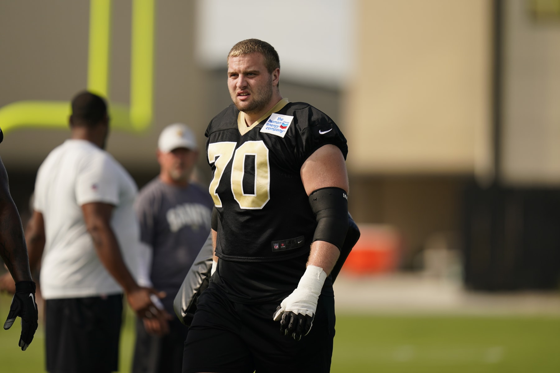 New Orleans Saints offensive tackle Trevor Penning (70) participates in drills during training camp at their NFL football training facility in Metairie, La., Saturday, July 30, 2022. (AP Photo/Gerald Herbert)