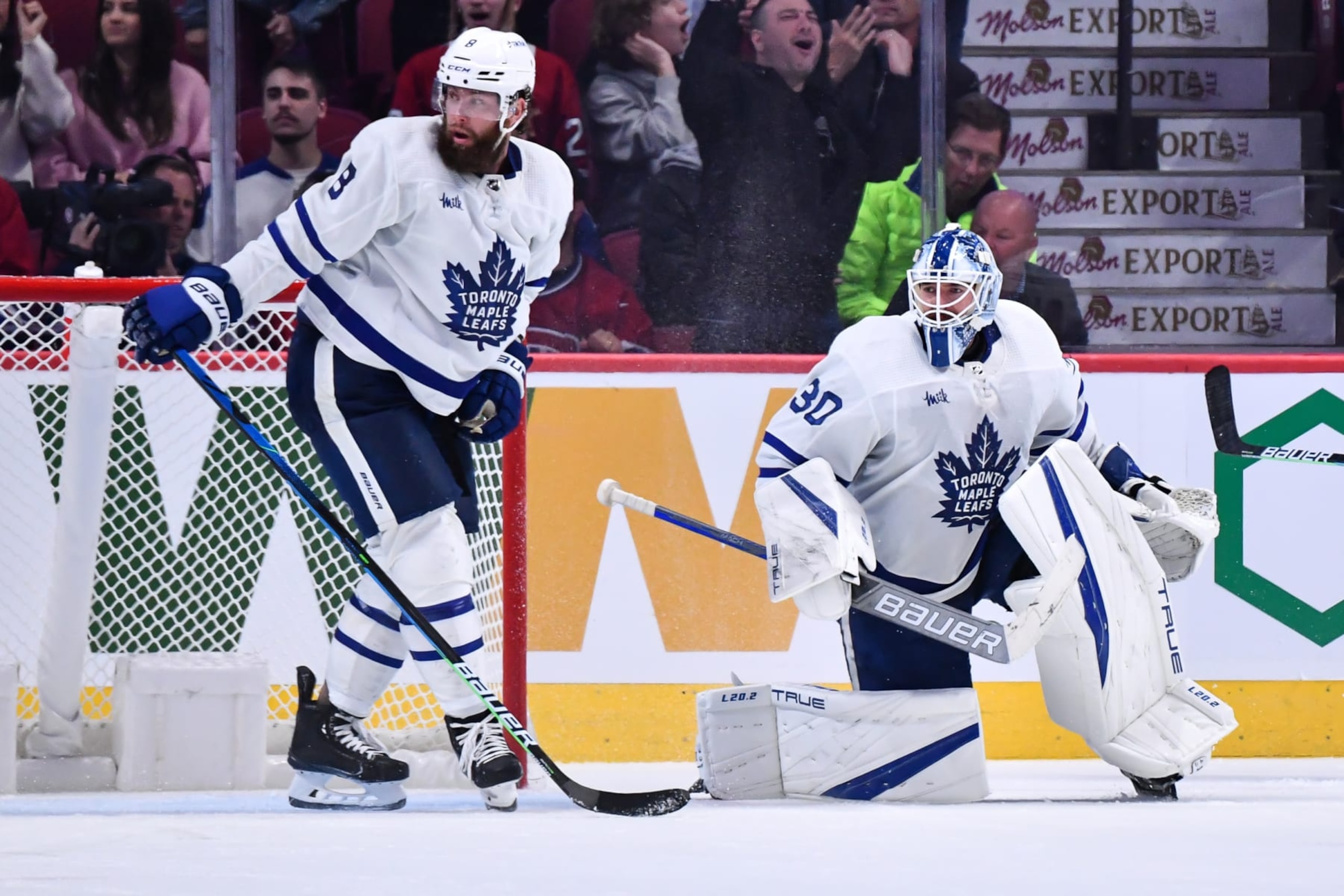 Toronto Maple Leafs defenseman Jake Muzzin (left) and goaltender Matt Murray. 