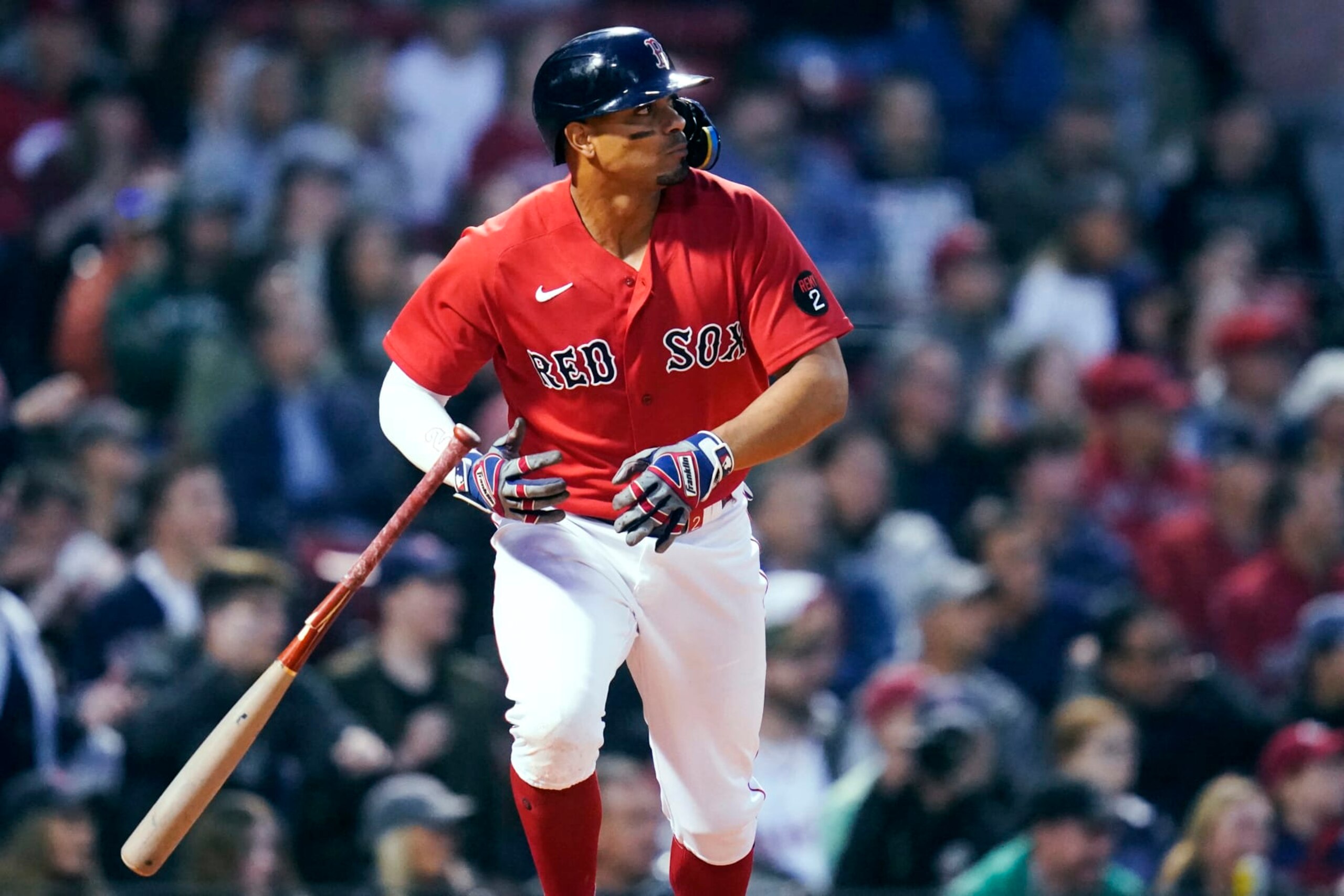 Boston Red Sox's Xander Bogaerts tosses his bat after hitting an RBI single against the Cincinnati Reds during the fourth inning of a baseball game Wednesday, June 1, 2022, at Fenway Park in Boston. (AP Photo/Charles Krupa) Boston Red Sox's Xander Bogaerts tosses his bat after hitting an RBI single against the Cincinnati Reds during the fourth inning of a baseball game Wednesday, June 1, 2022, at Fenway Park in Boston. (AP Photo/Charles Krupa)