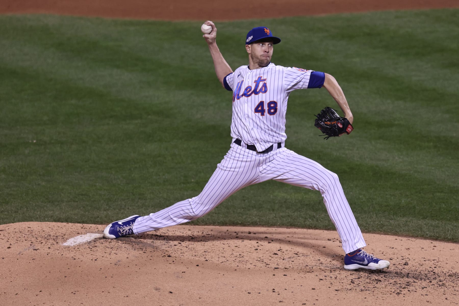 NEW YORK, NEW YORK - OCTOBER 08: Jacob deGrom #48 of the New York Mets delivers during the third inning against the San Diego Padres in game two of the Wild Card Series at Citi Field on October 08, 2022 in New York City. (Photo by Dustin Satloff/Getty Images)