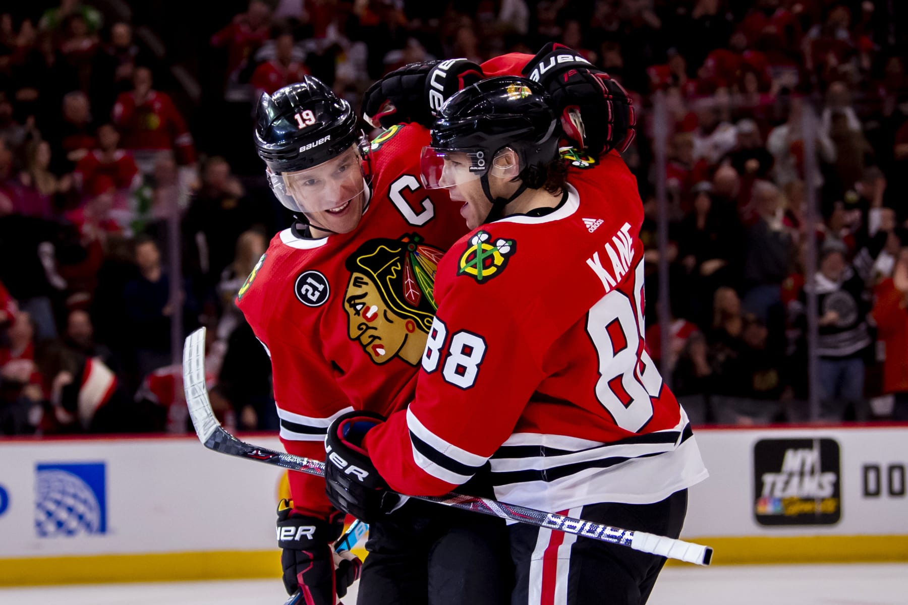 CHICAGO, IL - FEBRUARY 10: Chicago Blackhawks right wing Patrick Kane (88) celebrates his goal with center Jonathan Toews (19) during a game against the Detroit Red Wings on February 10, 2019, at the United Center in Chicago, IL. (Photo by Patrick Gorski/Icon Sportswire via Getty Images)