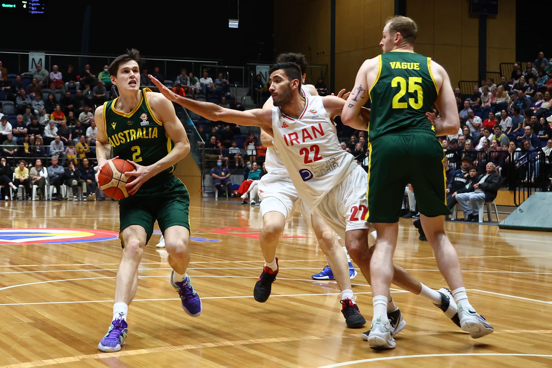 BENDIGO, AUSTRALIA - AUGUST 29: Alex Toohey of Australia (L) looks to pass during the FIBA World Cup 2023 Asian Qualifier match between the Australia Boomers and Iran at Red Energy Arena on August 29, 2022 in Bendigo, Australia. (Photo by Graham Denholm/Getty Images)