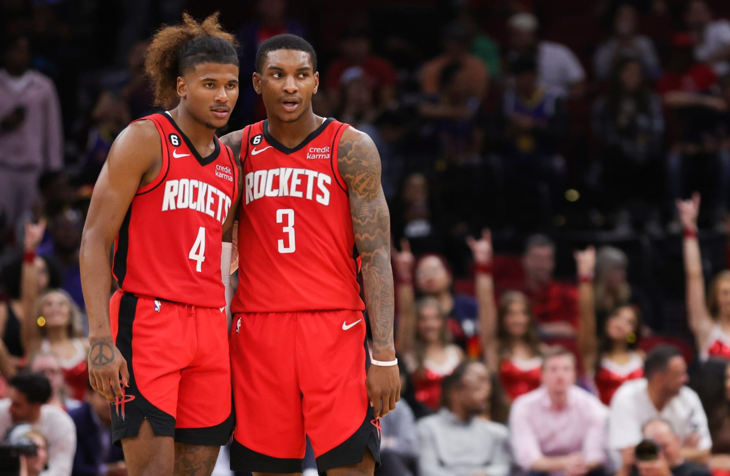HOUSTON, TEXAS - OCTOBER 24: Jalen Green #4 and Kevin Porter Jr. #3 of the Houston Rockets talk during a time out during the second half against the Utah Jazz at Toyota Center on October 24, 2022 in Houston, Texas. NOTE TO USER: User expressly acknowledges and agrees that, by downloading and or using this photograph, User is consenting to the terms and conditions of the Getty Images License Agreement. (Photo by Carmen Mandato/Getty Images) HOUSTON, TEXAS - OCTOBER 24: Jalen Green #4 and Kevin Porter Jr. #3 of the Houston Rockets talk during a time out during the second half against the Utah Jazz at Toyota Center on October 24, 2022 in Houston, Texas. NOTE TO USER: User expressly acknowledges and agrees that, by downloading and or using this photograph, User is consenting to the terms and conditions of the Getty Images License Agreement. (Photo by Carmen Mandato/Getty Images)