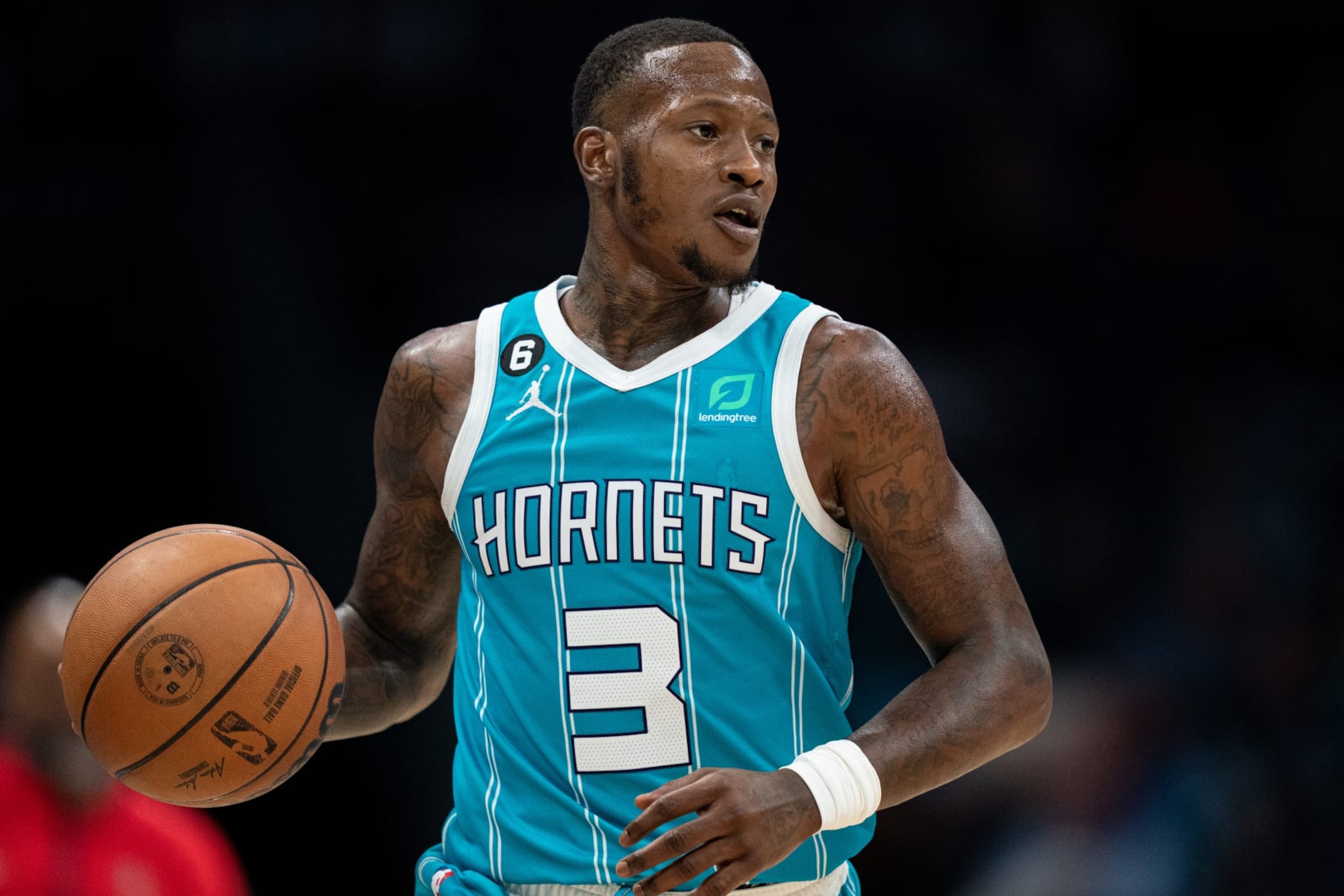 CHARLOTTE, NORTH CAROLINA - NOVEMBER 07: Terry Rozier #3 of the Charlotte Hornets brings the ball up court in the third quarter during their game against the Washington Wizards at Spectrum Center on November 07, 2022 in Charlotte, North Carolina. NOTE TO USER: User expressly acknowledges and agrees that, by downloading and or using this photograph, User is consenting to the terms and conditions of the Getty Images License Agreement. (Photo by Jacob Kupferman/Getty Images) CHARLOTTE, NORTH CAROLINA - NOVEMBER 07: Terry Rozier #3 of the Charlotte Hornets brings the ball up court in the third quarter during their game against the Washington Wizards at Spectrum Center on November 07, 2022 in Charlotte, North Carolina. NOTE TO USER: User expressly acknowledges and agrees that, by downloading and or using this photograph, User is consenting to the terms and conditions of the Getty Images License Agreement. (Photo by Jacob Kupferman/Getty Images)