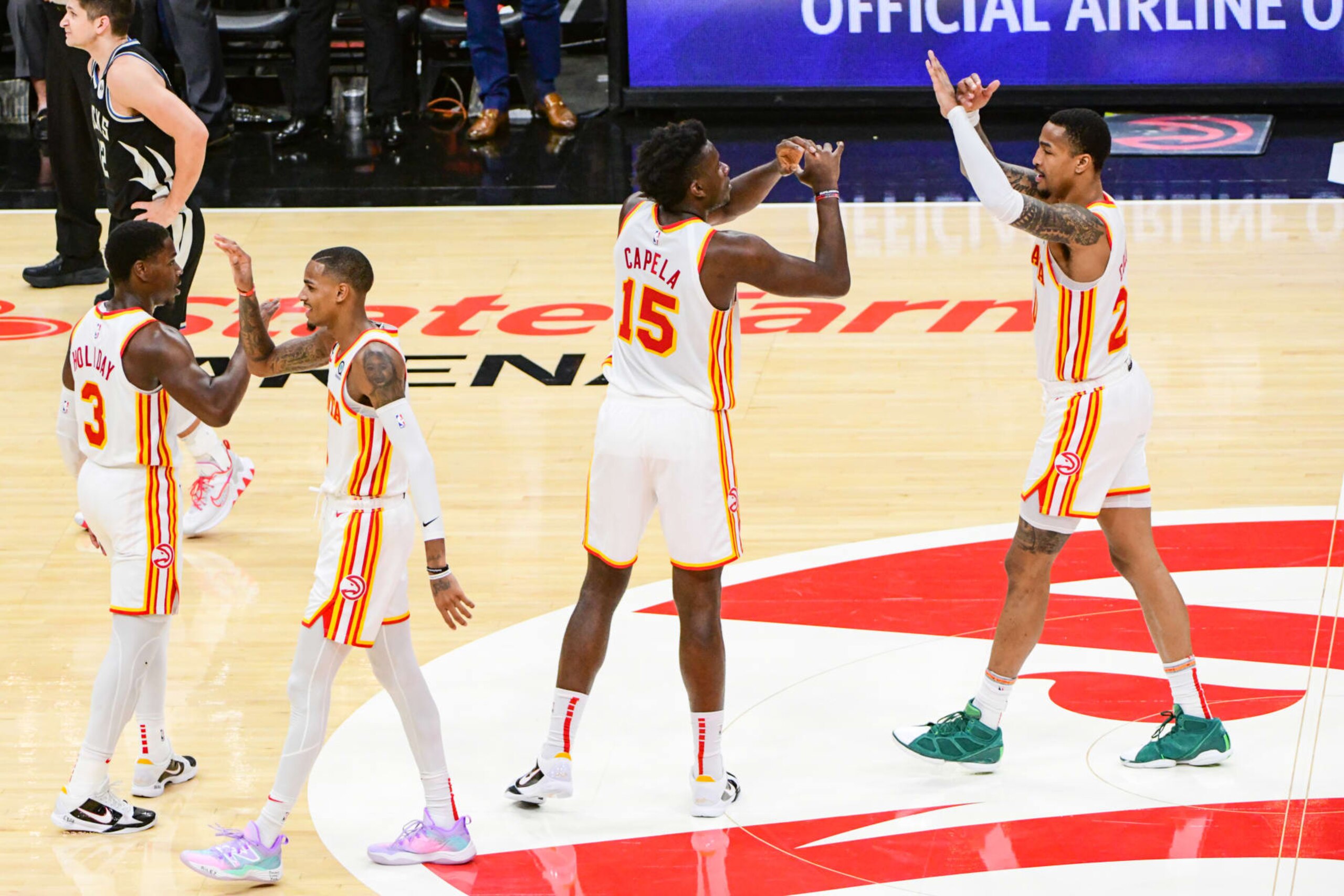 ATLANTA, GA - NOVEMBER 7: The Atlanta Hawks celebrate against the Milwaukee Bucks on November 7, 2022 at State Farm Arena in Atlanta, Georgia. NOTE TO USER: User expressly acknowledges and agrees that, by downloading and/or using this Photograph, user is consenting to the terms and conditions of the Getty Images License Agreement. Mandatory Copyright Notice: Copyright 2022 NBAE (Photo by Scott Cunningham/NBAE via Getty Images) ATLANTA, GA - NOVEMBER 7: The Atlanta Hawks celebrate against the Milwaukee Bucks on November 7, 2022 at State Farm Arena in Atlanta, Georgia. NOTE TO USER: User expressly acknowledges and agrees that, by downloading and/or using this Photograph, user is consenting to the terms and conditions of the Getty Images License Agreement. Mandatory Copyright Notice: Copyright 2022 NBAE (Photo by Scott Cunningham/NBAE via Getty Images)