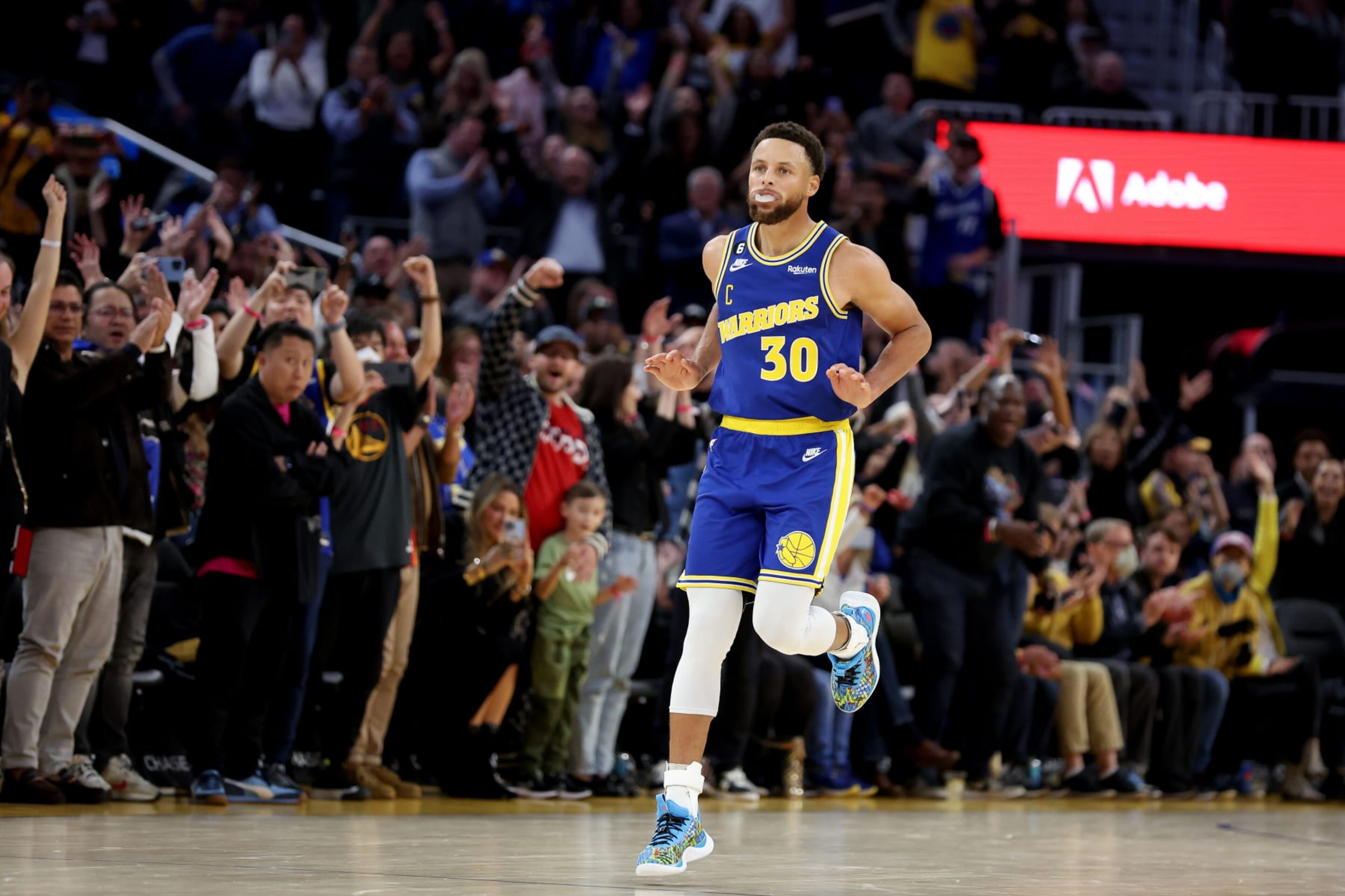 SAN FRANCISCO, CALIFORNIA - NOVEMBER 07: Stephen Curry #30 of the Golden State Warriors reacts after making a basket against the Sacramento Kings at Chase Center on November 07, 2022 in San Francisco, California. NOTE TO USER: User expressly acknowledges and agrees that, by downloading and or using this photograph, User is consenting to the terms and conditions of the Getty Images License Agreement.  (Photo by Ezra Shaw/Getty Images)