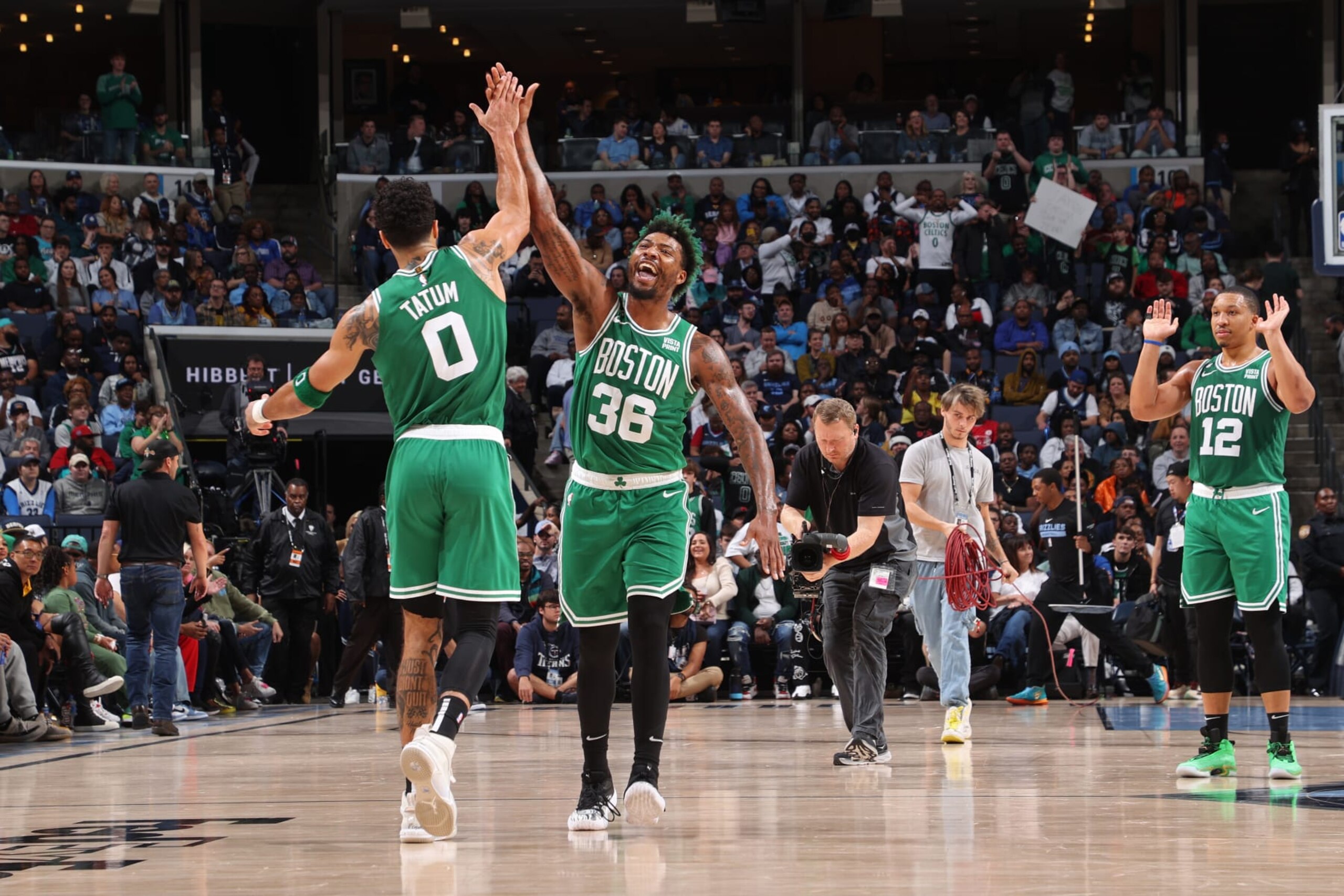 MEMPHIS, TN - NOVEMBER 7: Jayson Tatum #0 and Marcus Smart #36 of the Boston Celtics celebrate against the Memphis Grizzlies on November 7, 2022 at FedExForum in Memphis, Tennessee. NOTE TO USER: User expressly acknowledges and agrees that, by downloading and or using this photograph, User is consenting to the terms and conditions of the Getty Images License Agreement. Mandatory Copyright Notice: Copyright 2022 NBAE (Photo by Joe Murphy/NBAE via Getty Images) MEMPHIS, TN - NOVEMBER 7: Jayson Tatum #0 and Marcus Smart #36 of the Boston Celtics celebrate against the Memphis Grizzlies on November 7, 2022 at FedExForum in Memphis, Tennessee. NOTE TO USER: User expressly acknowledges and agrees that, by downloading and or using this photograph, User is consenting to the terms and conditions of the Getty Images License Agreement. Mandatory Copyright Notice: Copyright 2022 NBAE (Photo by Joe Murphy/NBAE via Getty Images)
