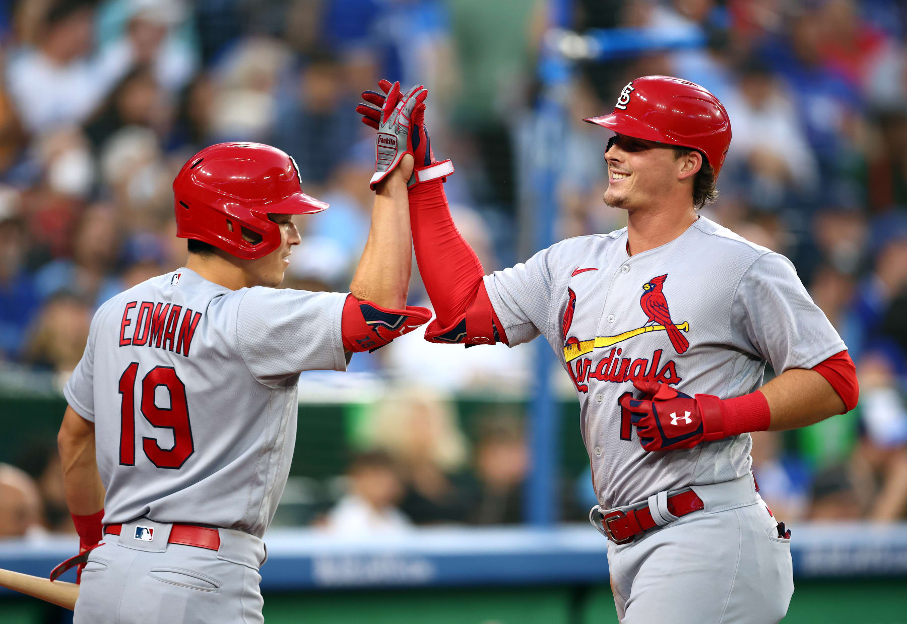 TORONTO, ON - JULY 27:  Nolan Gorman #16 of the St. Louis Cardinals celebrates with Tommy Edman #19 after hitting a solo home run in the fifth inning against the Toronto Blue Jays at Rogers Centre on July 27, 2022 in Toronto, Ontario, Canada.  (Photo by Vaughn Ridley/Getty Images)