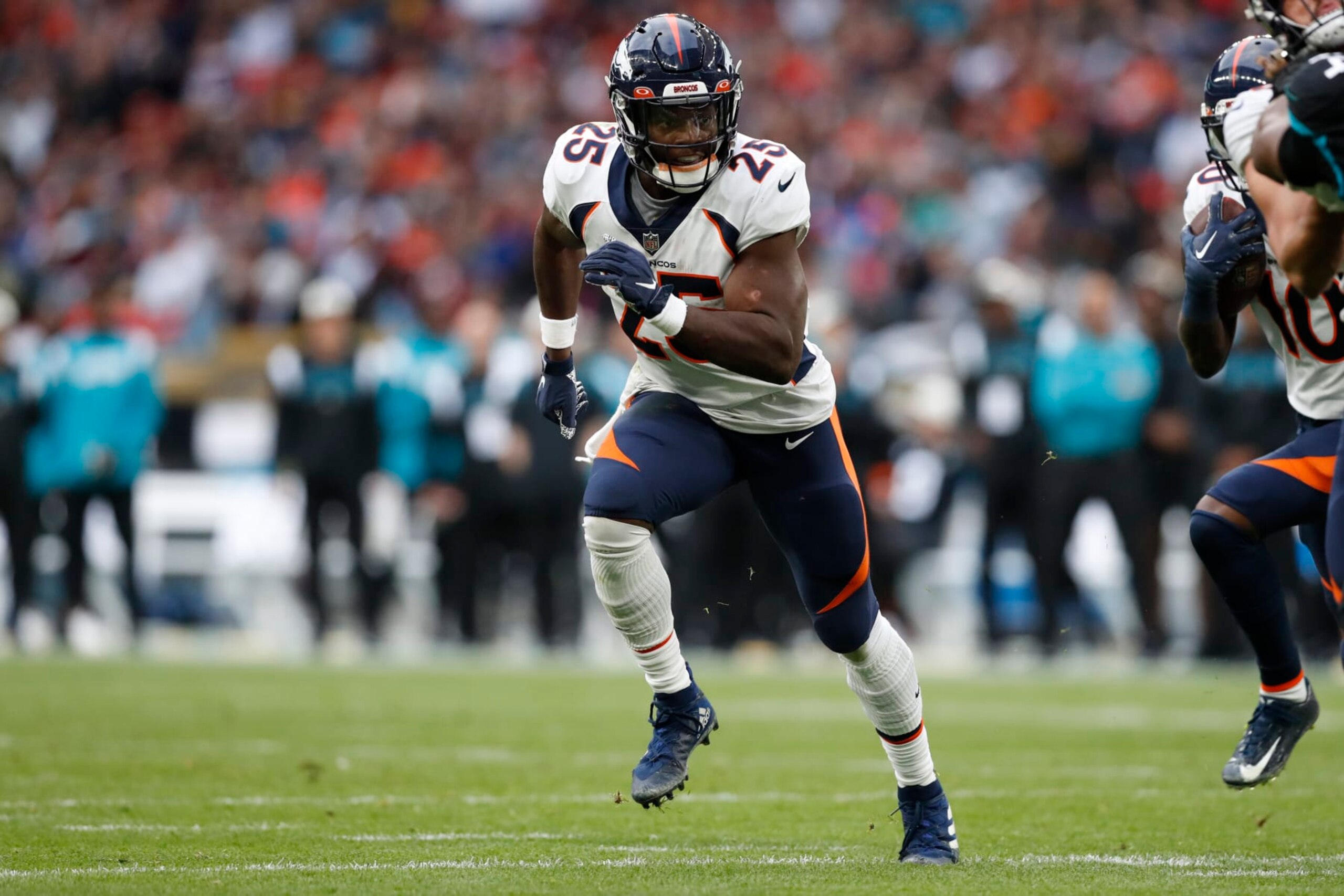 Denver Broncos running back Melvin Gordon III (25) in action during an NFL football game against the Jacksonville Jaguars at Wembley Stadium in London, Sunday, Oct. 30, 2022. The Denver Broncos defeated the Jacksonville Jaguars 21-17. (AP Photo/Steve Luciano)