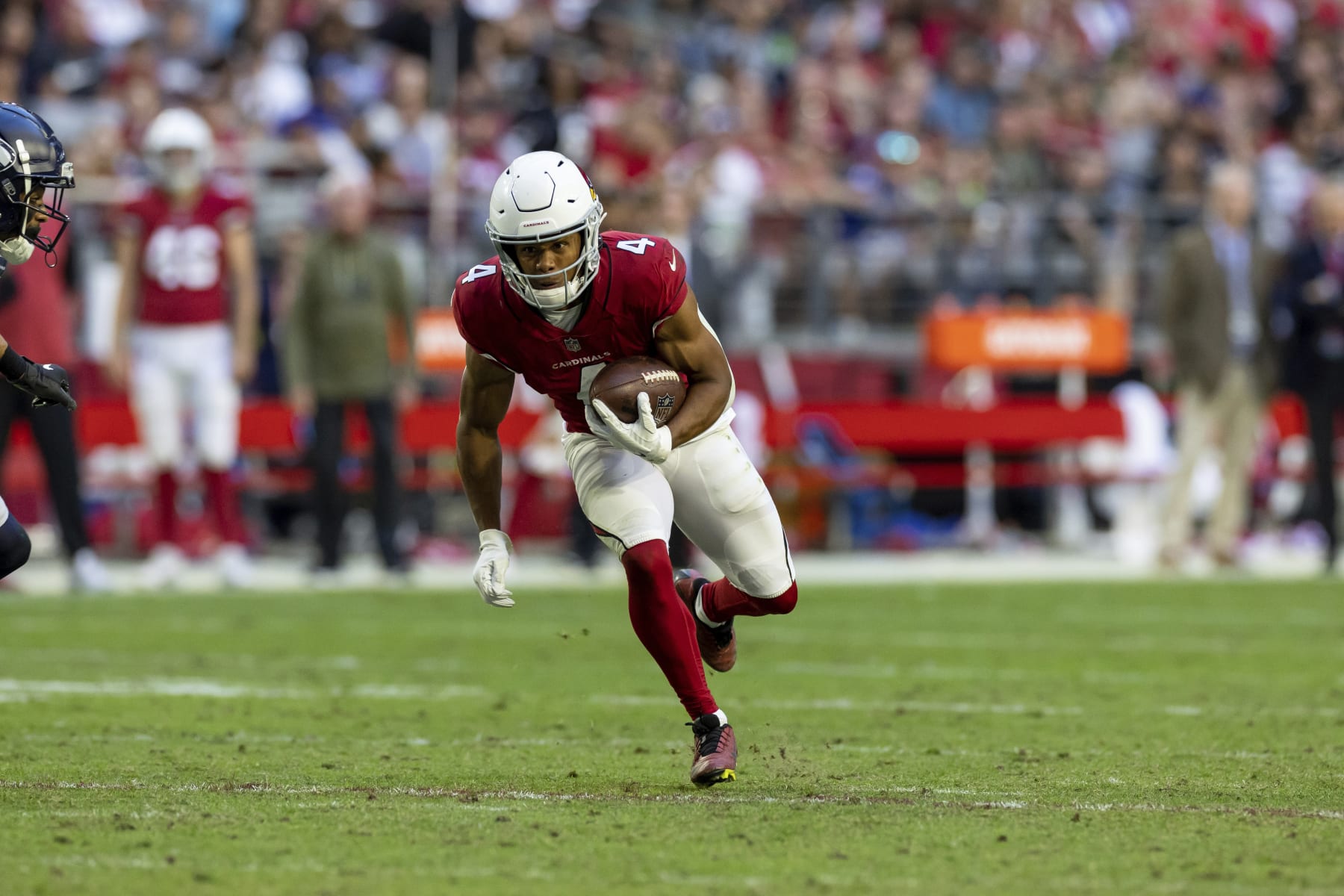 Arizona Cardinals wide receiver Rondale Moore (4) against the Seattle Seahawks in an NFL football game, Sunday, Nov. 6, 2022, in Glendale, Ariz. Seahawks won 31-21. (AP Photo/Jeff Lewis)