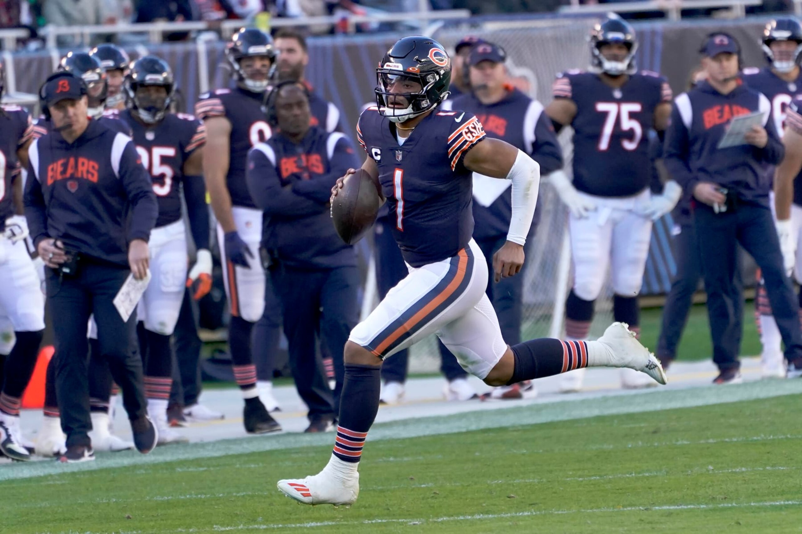 Chicago Bears quarterback Justin Fields carries the ball during an NFL football game against the Miami Dolphins Sunday, Nov. 6, 2022, in Chicago. (AP Photo/Charles Rex Arbogast) Chicago Bears quarterback Justin Fields carries the ball during an NFL football game against the Miami Dolphins Sunday, Nov. 6, 2022, in Chicago. (AP Photo/Charles Rex Arbogast)