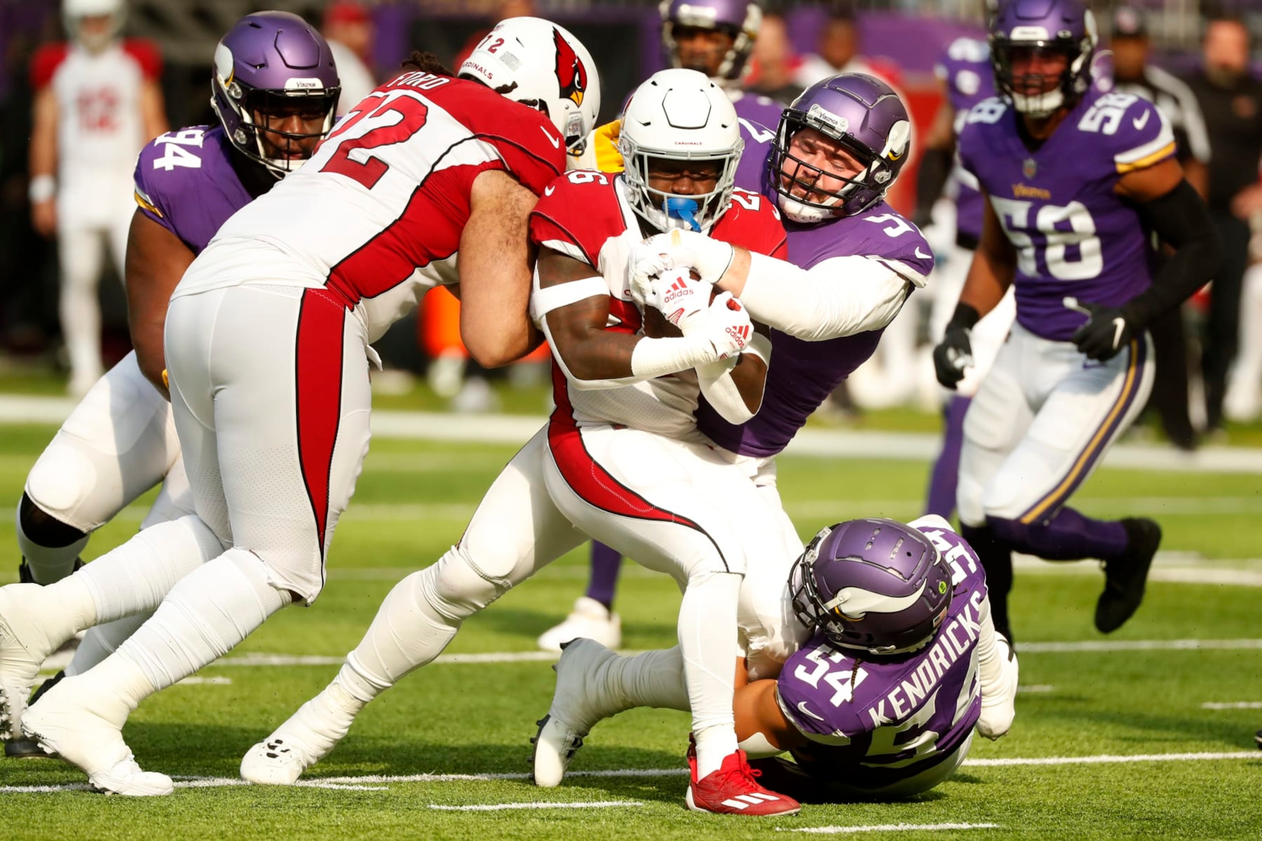 Arizona Cardinals running back Eno Benjamin (26) is tackled by Minnesota Vikings defensive tackle Harrison Phillips (97) during the first half of an NFL football game, Sunday, Oct. 30, 2022, in Minneapolis. (AP Photo/Bruce Kluckhohn) Arizona Cardinals running back Eno Benjamin (26) is tackled by Minnesota Vikings defensive tackle Harrison Phillips (97) during the first half of an NFL football game, Sunday, Oct. 30, 2022, in Minneapolis. (AP Photo/Bruce Kluckhohn)