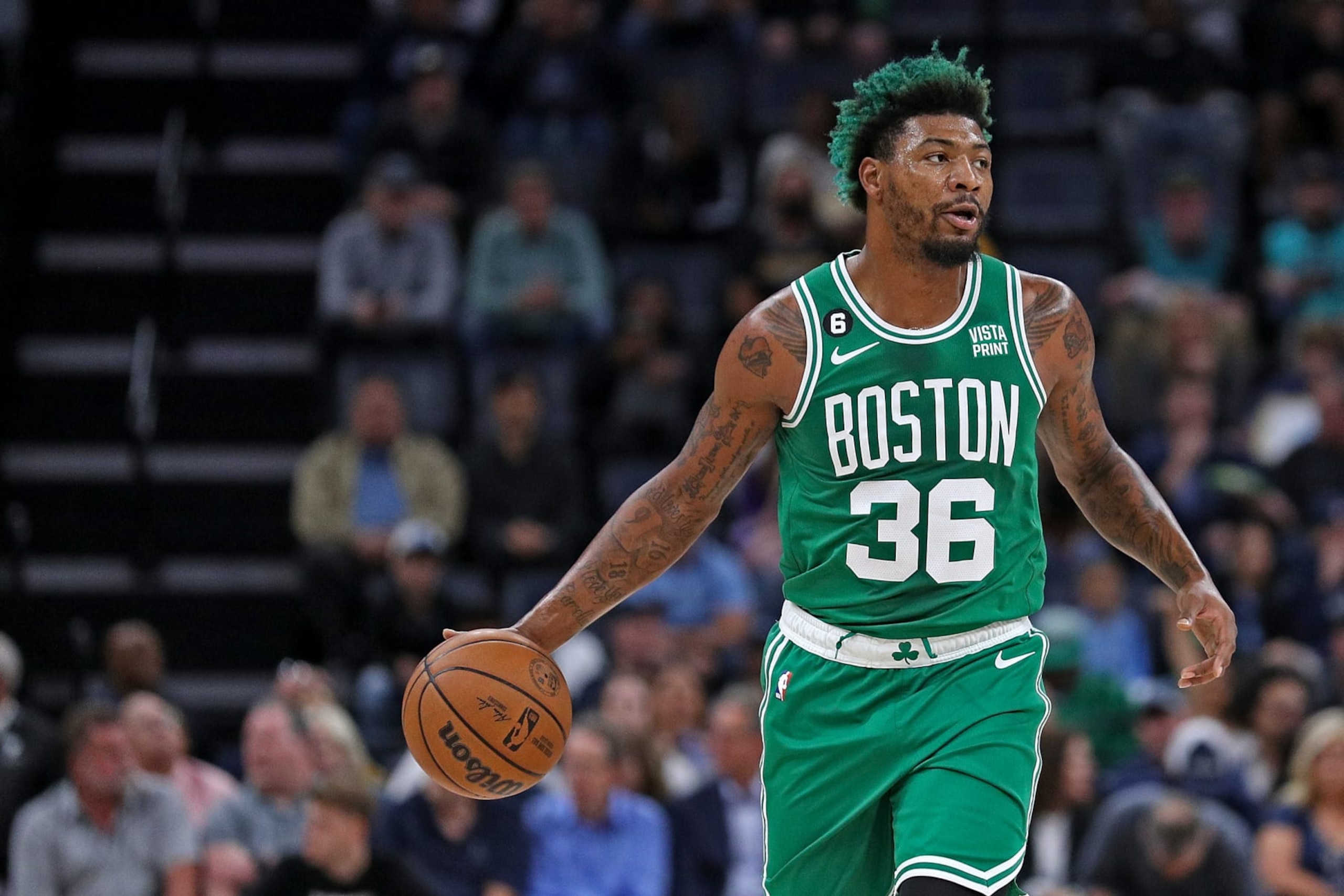 MEMPHIS, TENNESSEE - NOVEMBER 07: Marcus Smart #36 of the Boston Celtics brings the ball up court during the game against the Memphis Grizzlies at FedExForum on November 07, 2022 in Memphis, Tennessee. NOTE TO USER: User expressly acknowledges and agrees that, by downloading and or using this photograph, User is consenting to the terms and conditions of the Getty Images License Agreement. (Photo by Justin Ford/Getty Images)