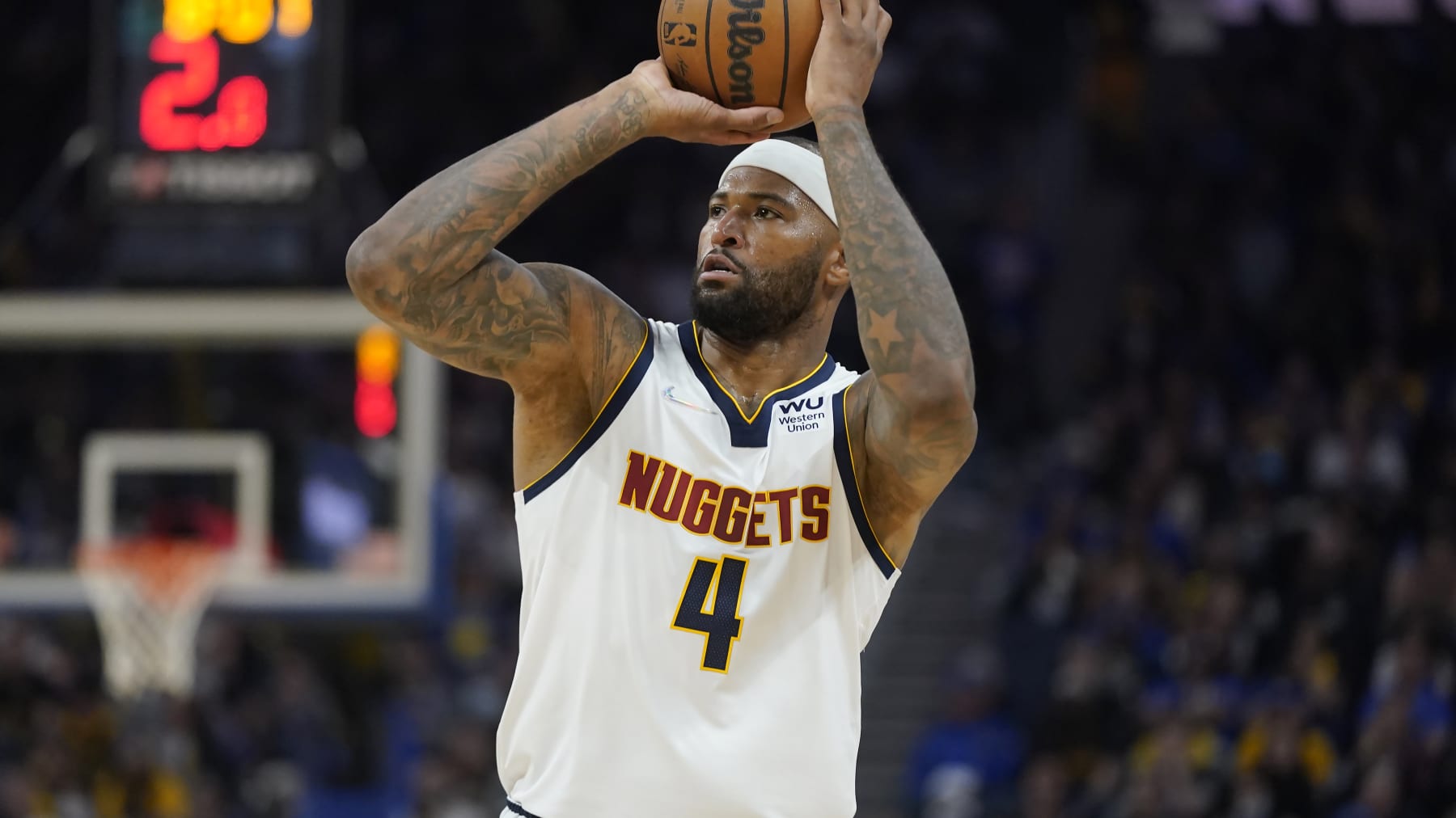 Denver Nuggets center DeMarcus Cousins (4) against the Golden State Warriors during Game 1 of an NBA basketball first-round playoff series in San Francisco, Saturday, April 16, 2022. (AP Photo/Jeff Chiu)