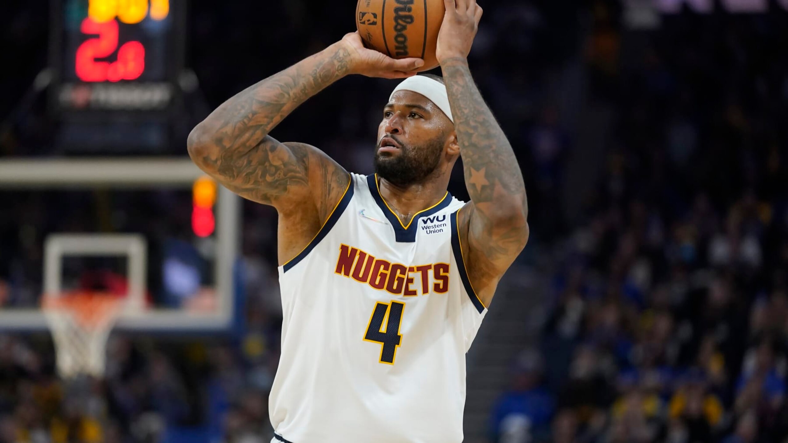 Denver Nuggets center DeMarcus Cousins (4) against the Golden State Warriors during Game 1 of an NBA basketball first-round playoff series in San Francisco, Saturday, April 16, 2022. (AP Photo/Jeff Chiu)