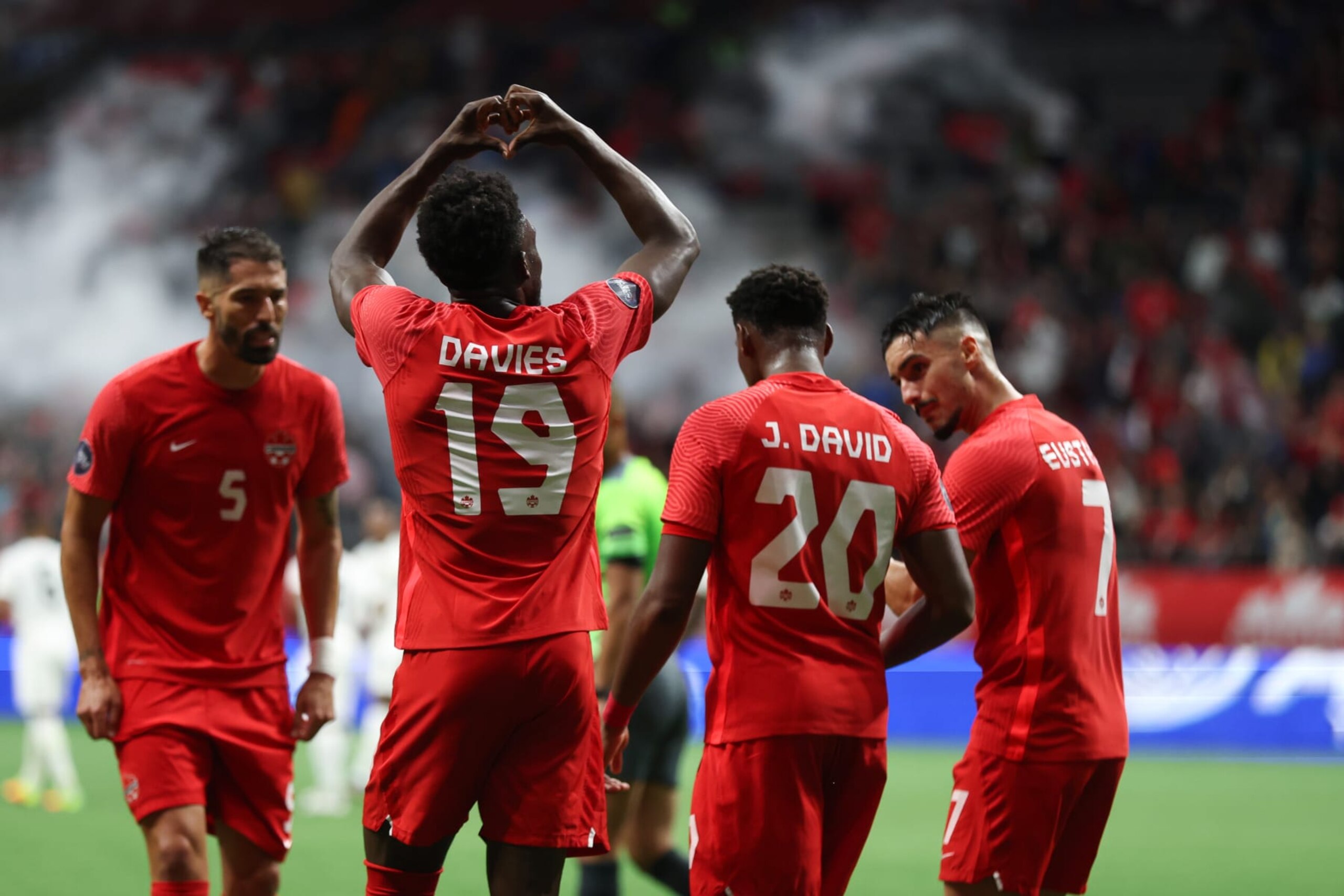 VANCOUVER, BC - JUNE 09: Alphonso Davies of Canada celebrates after scoring a goal to make it 1-0 during the Canada v Curacao CONCACAF Nations League Group C match at BC Place on June 9, 2022 in Vancouver, Canada. (Photo by Matthew Ashton - AMA/Getty Images) VANCOUVER, BC - JUNE 09: Alphonso Davies of Canada celebrates after scoring a goal to make it 1-0 during the Canada v Curacao CONCACAF Nations League Group C match at BC Place on June 9, 2022 in Vancouver, Canada. (Photo by Matthew Ashton - AMA/Getty Images)
