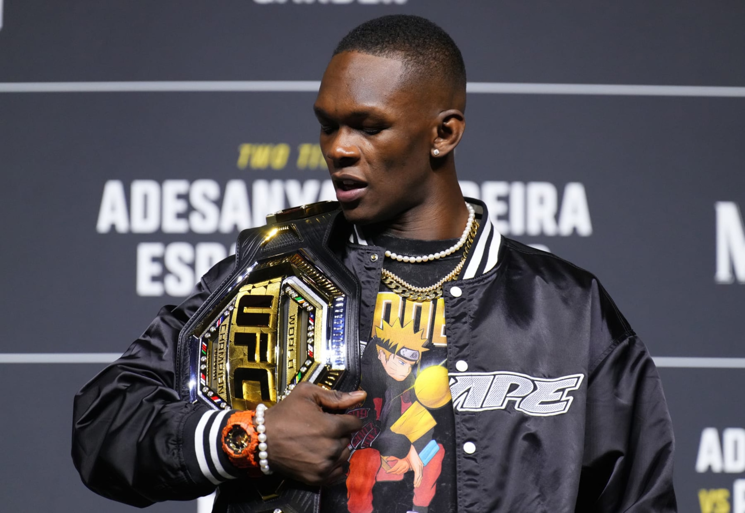 NEW YORK, NEW YORK - NOVEMBER 09: Israel Adesanya of Nigeria poses on stage during the UFC 281 press conference at Madison Square Garden on November 09, 2022 in New York City. (Photo by Chris Unger/Zuffa LLC)