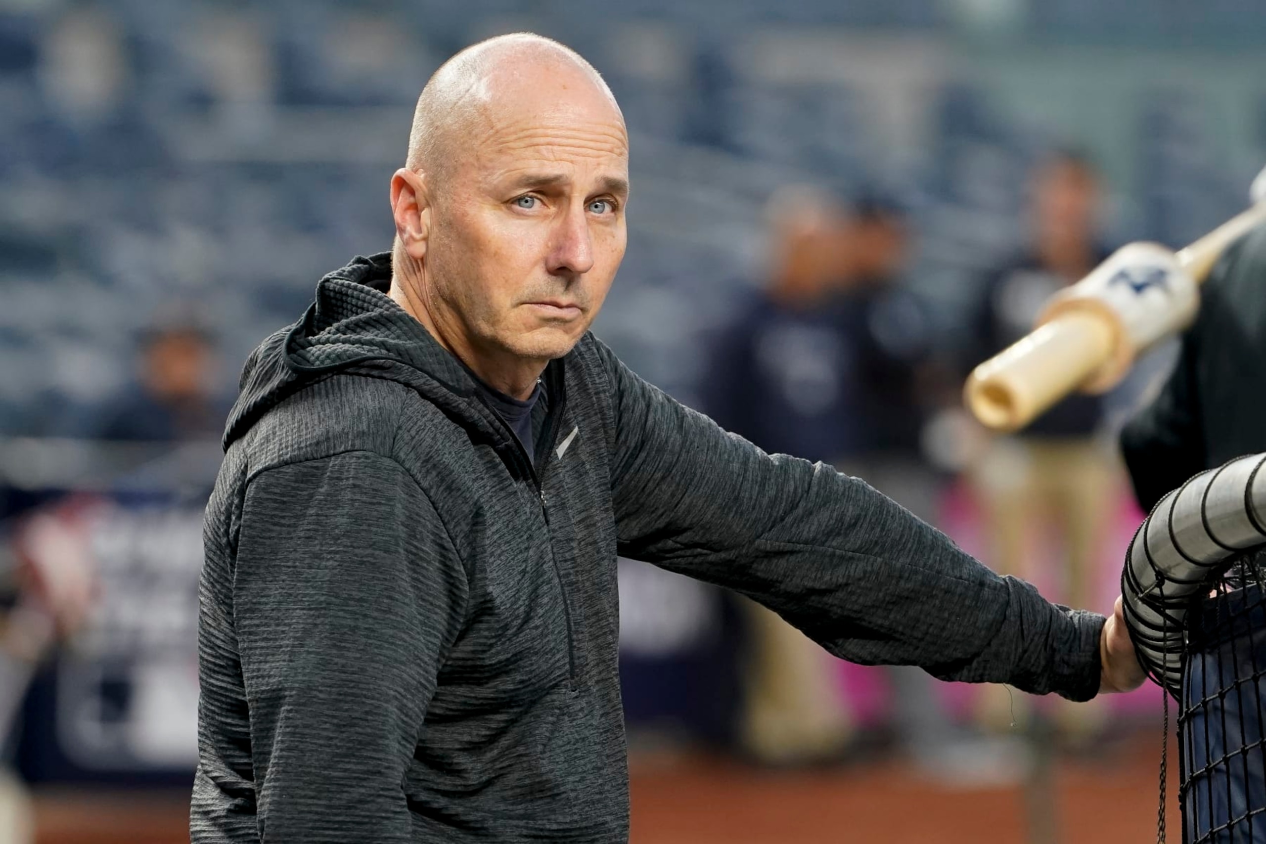 New York Yankees general manager Brian Cashman attends batting practice during a workout ahead of Game 1 of baseball's American League Division Series against the Cleveland Guardians, Monday, Oct. 10, 2022, in New York. (AP Photo/John Minchillo) New York Yankees general manager Brian Cashman attends batting practice during a workout ahead of Game 1 of baseball's American League Division Series against the Cleveland Guardians, Monday, Oct. 10, 2022, in New York. (AP Photo/John Minchillo)