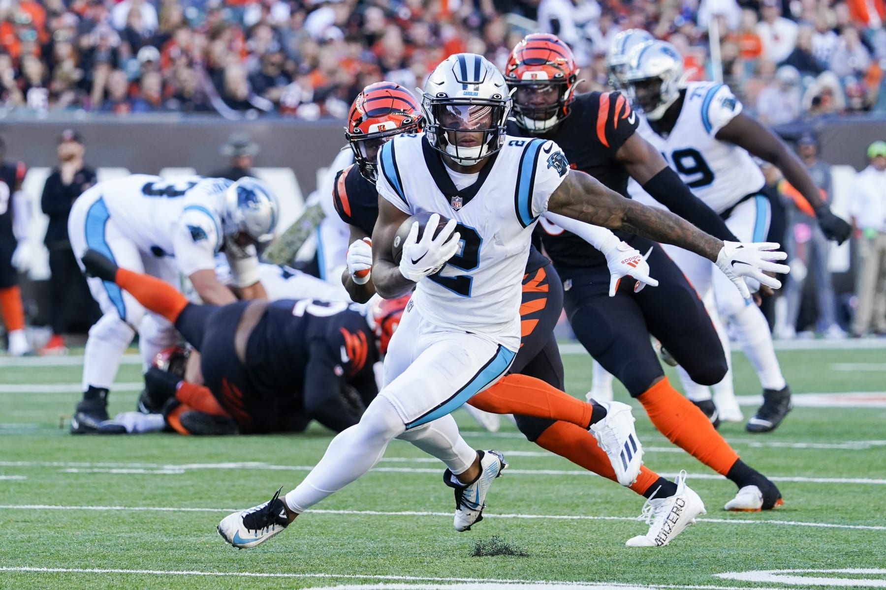 Carolina Panthers wide receiver DJ Moore (2) carries the ball after a reception during the second half of a NFL football game between the Cincinnati Bengals and the Carolina Panthers, Sunday, Nov. 6, 2022 in Cincinnati. (AP Photo/Joshua A. Bickel)