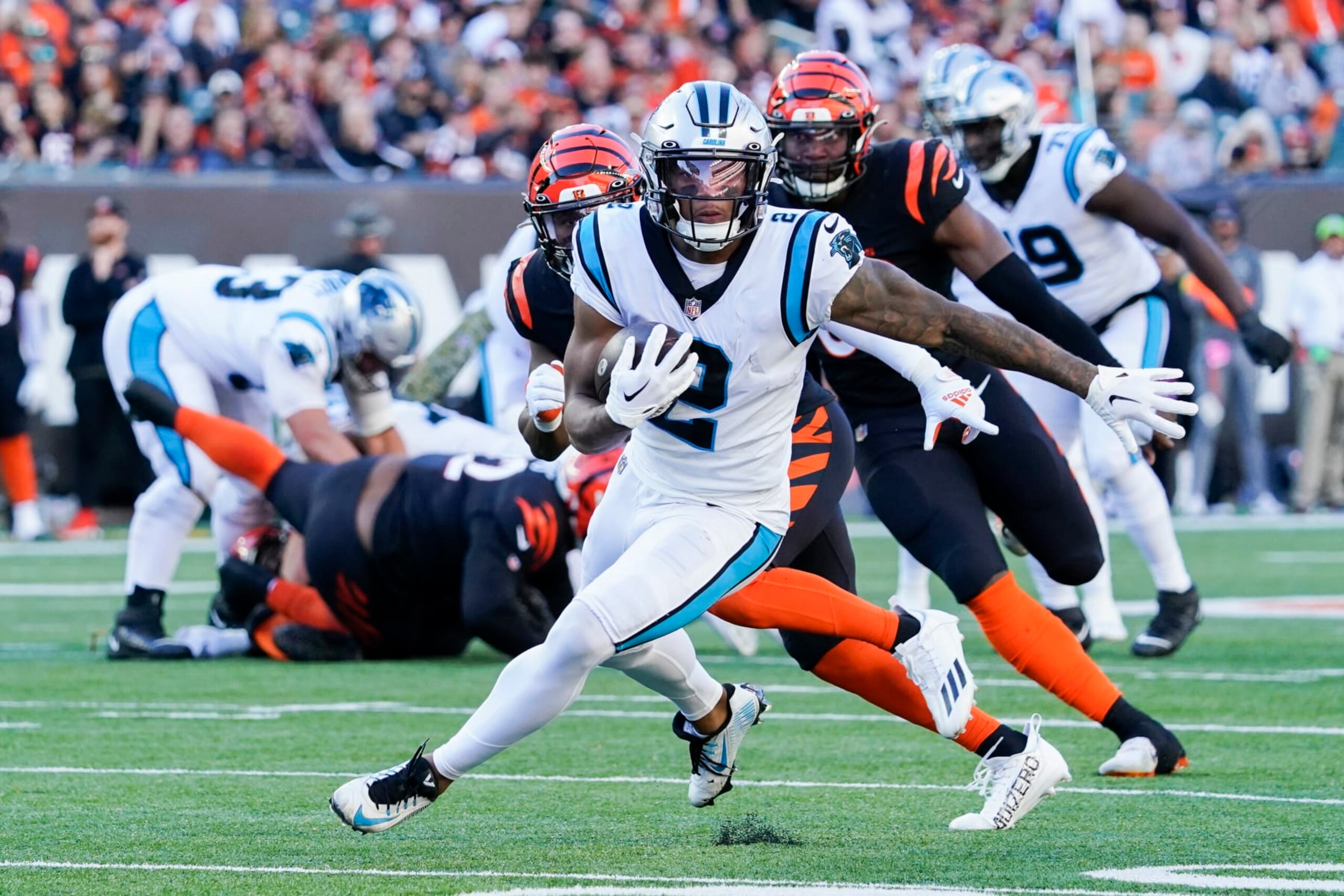 Carolina Panthers wide receiver DJ Moore (2) carries the ball after a reception during the second half of a NFL football game between the Cincinnati Bengals and the Carolina Panthers, Sunday, Nov. 6, 2022 in Cincinnati. (AP Photo/Joshua A. Bickel) Carolina Panthers wide receiver DJ Moore (2) carries the ball after a reception during the second half of a NFL football game between the Cincinnati Bengals and the Carolina Panthers, Sunday, Nov. 6, 2022 in Cincinnati. (AP Photo/Joshua A. Bickel)