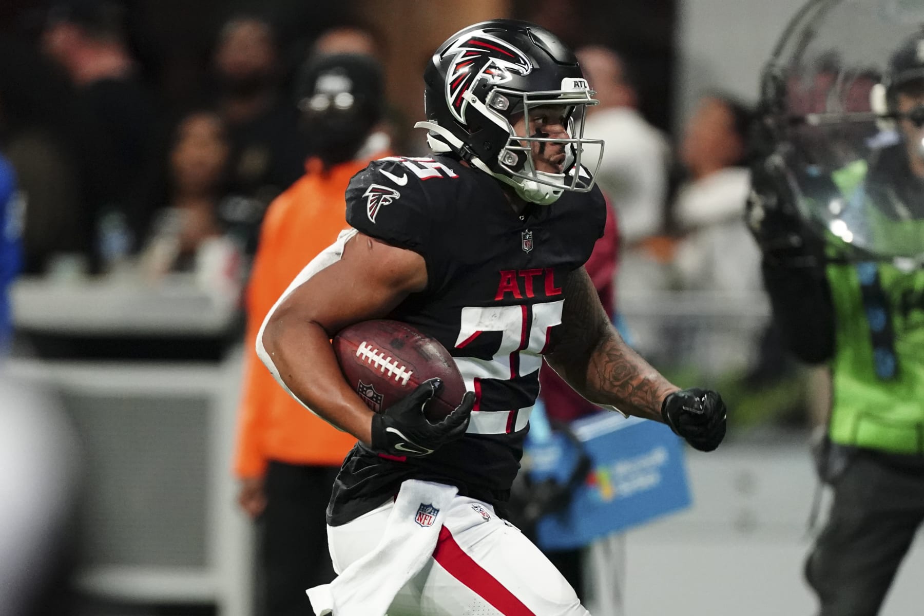 Atlanta Falcons running back Tyler Allgeier (25) is shown in action against the Carolina Panthers during an NFL football game Sunday, Oct. 30, 2022 in Atlanta. (AP Photo/John Bazemore)