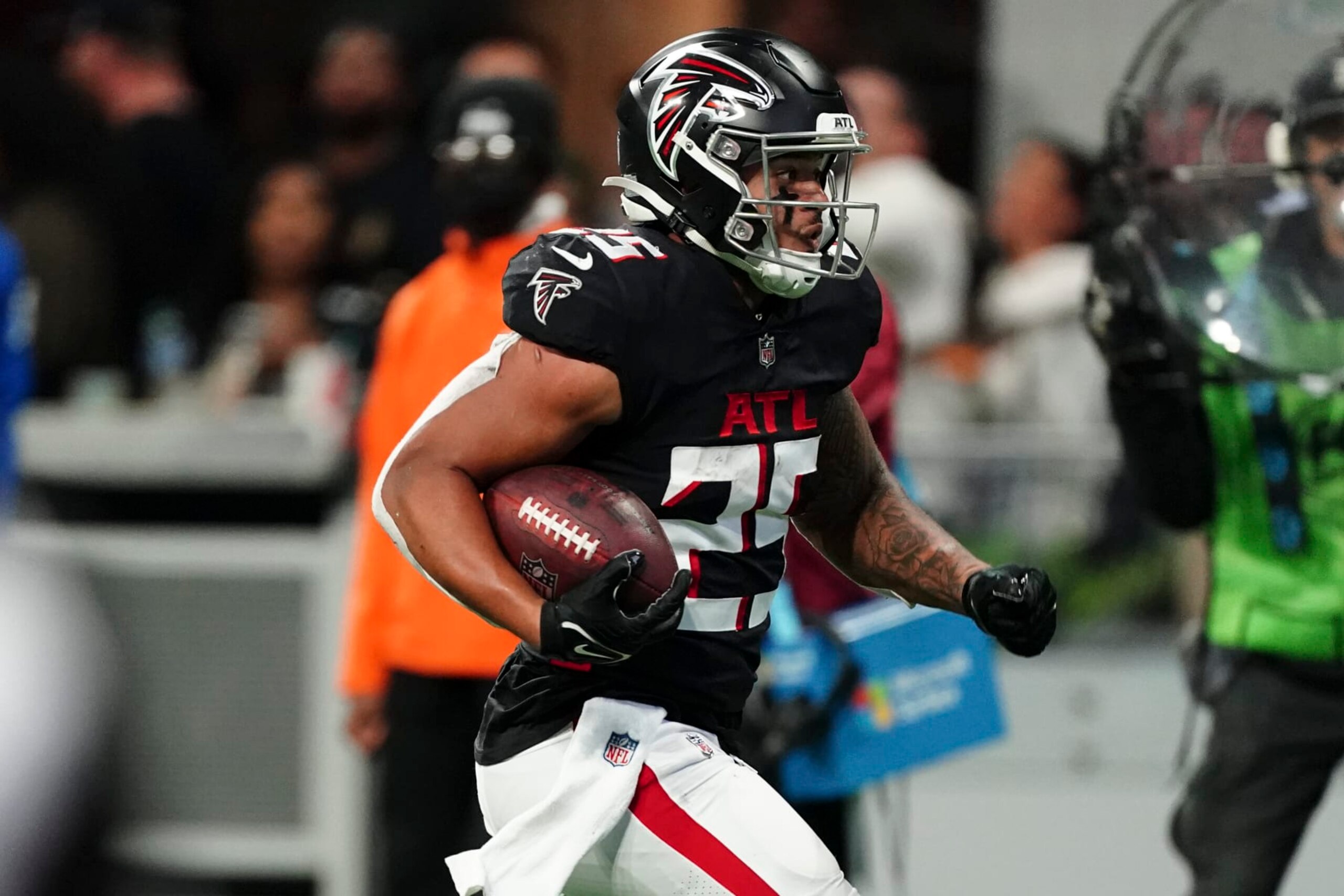 Atlanta Falcons running back Tyler Allgeier (25) is shown in action against the Carolina Panthers during an NFL football game Sunday, Oct. 30, 2022 in Atlanta. (AP Photo/John Bazemore) Atlanta Falcons running back Tyler Allgeier (25) is shown in action against the Carolina Panthers during an NFL football game Sunday, Oct. 30, 2022 in Atlanta. (AP Photo/John Bazemore)