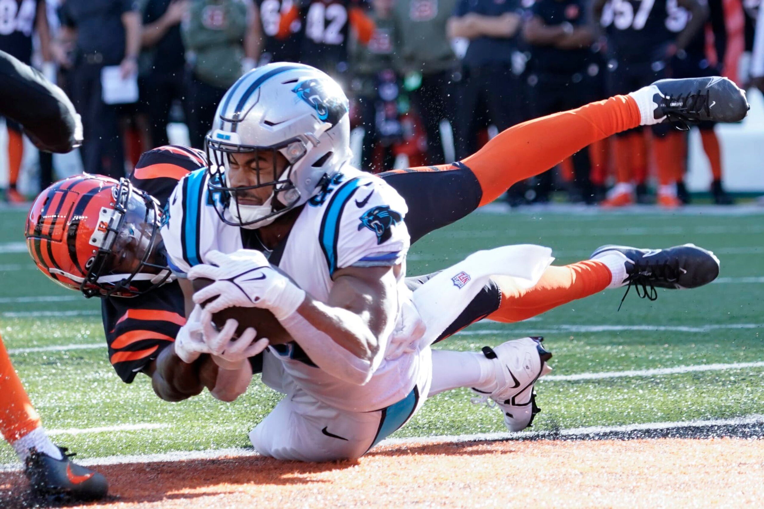 Carolina Panthers tight end Tommy Tremble (82) makes a touchdown catch as Cincinnati Bengals safety Dax Hill (23) defends during the second half of an NFL football game, Sunday, Nov. 6, 2022, in Cincinnati. (AP Photo/Joshua A. Bickel) Carolina Panthers tight end Tommy Tremble (82) makes a touchdown catch as Cincinnati Bengals safety Dax Hill (23) defends during the second half of an NFL football game, Sunday, Nov. 6, 2022, in Cincinnati. (AP Photo/Joshua A. Bickel)